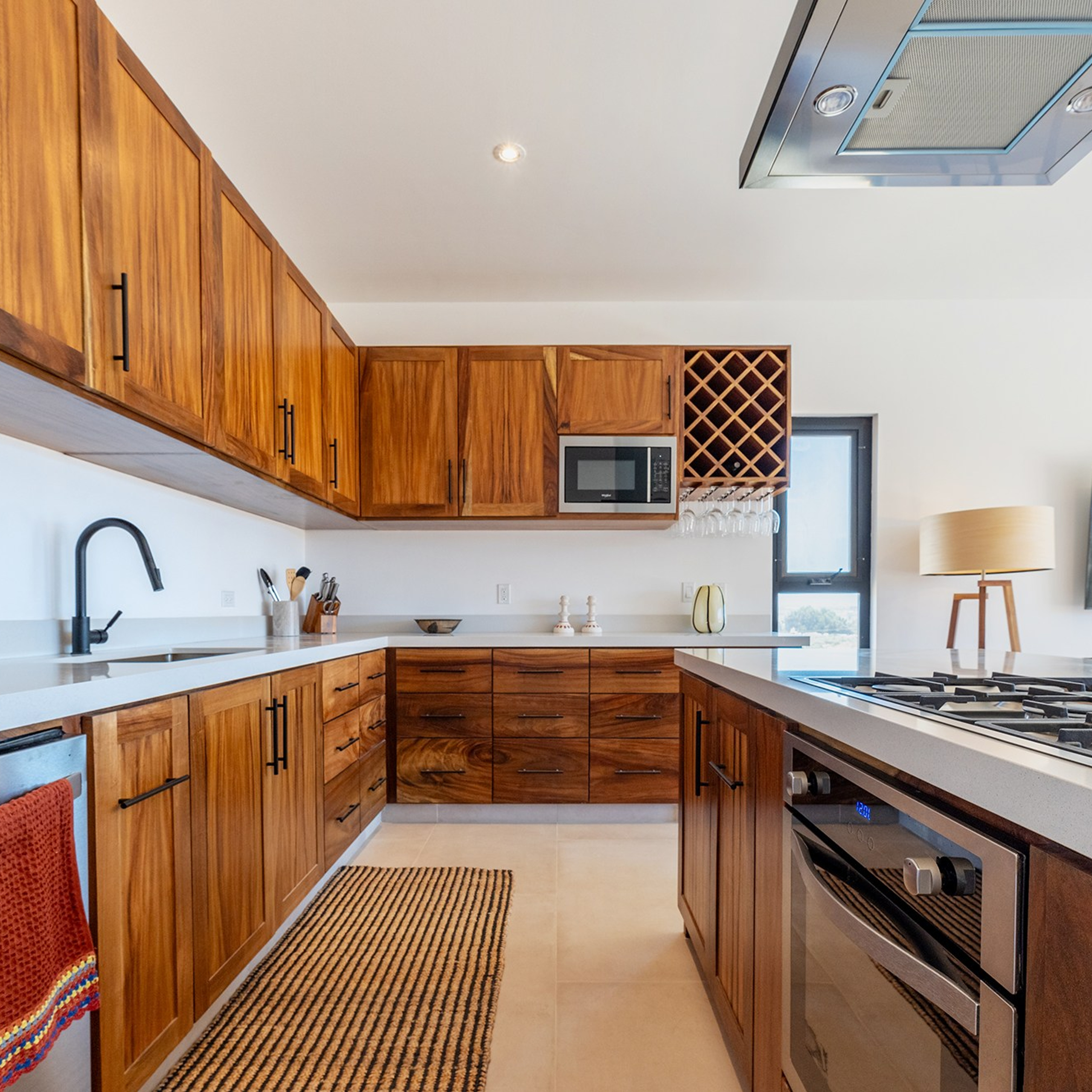 Modern kitchen and dining area with minimalist decor in Cerritos, Baja California Sur