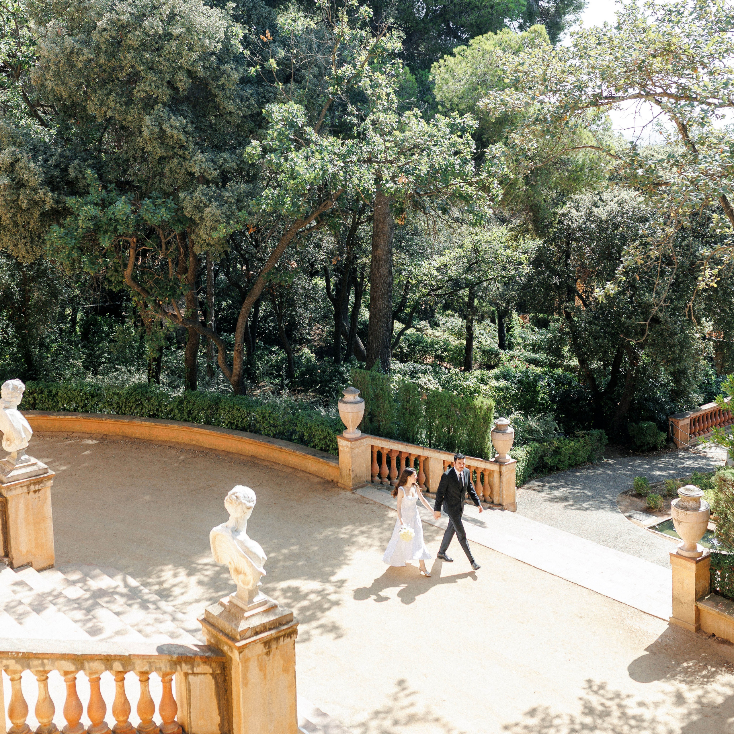 Couple having a walk in the garden on Barcelona 