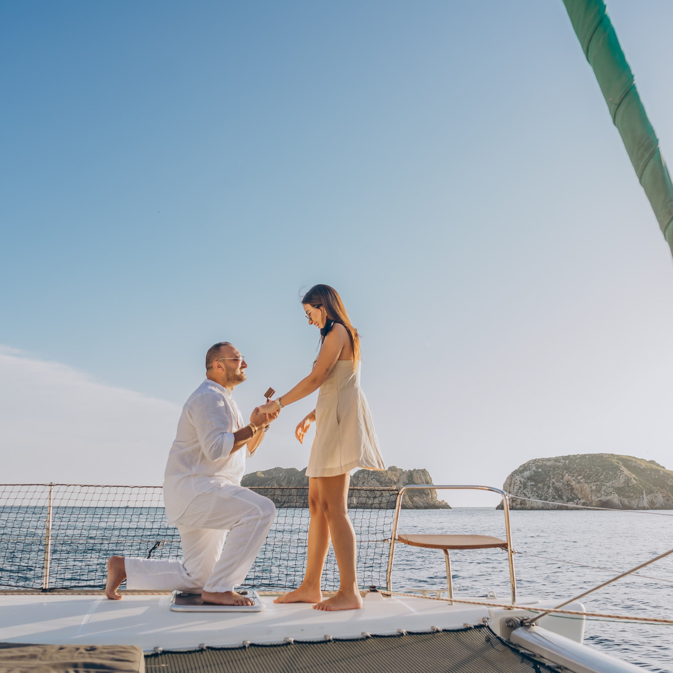 Engagement on a yacht at sunset
