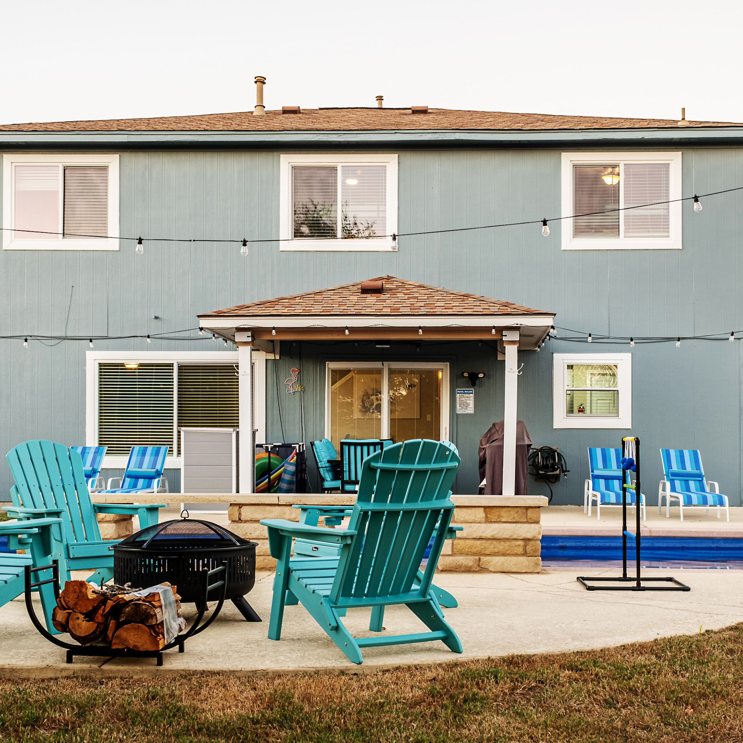 Modern two-story house with backyard pool photographed by Austin real estate photographer
