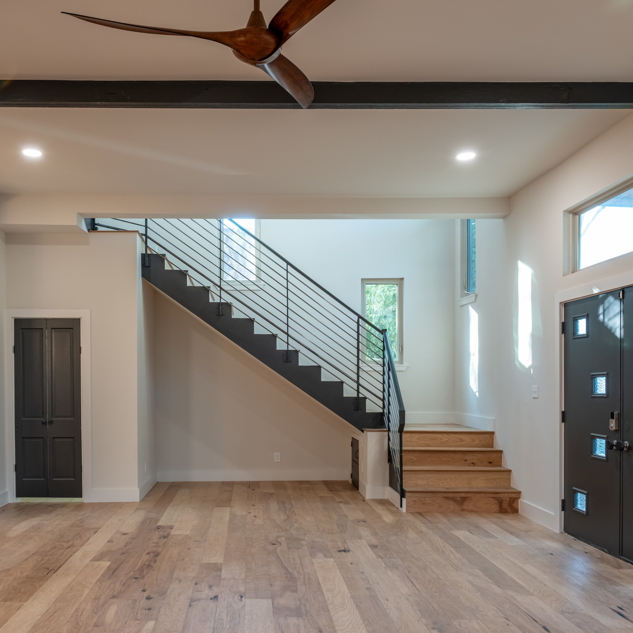 Bright contemporary living room with natural light photographed in Austin TX