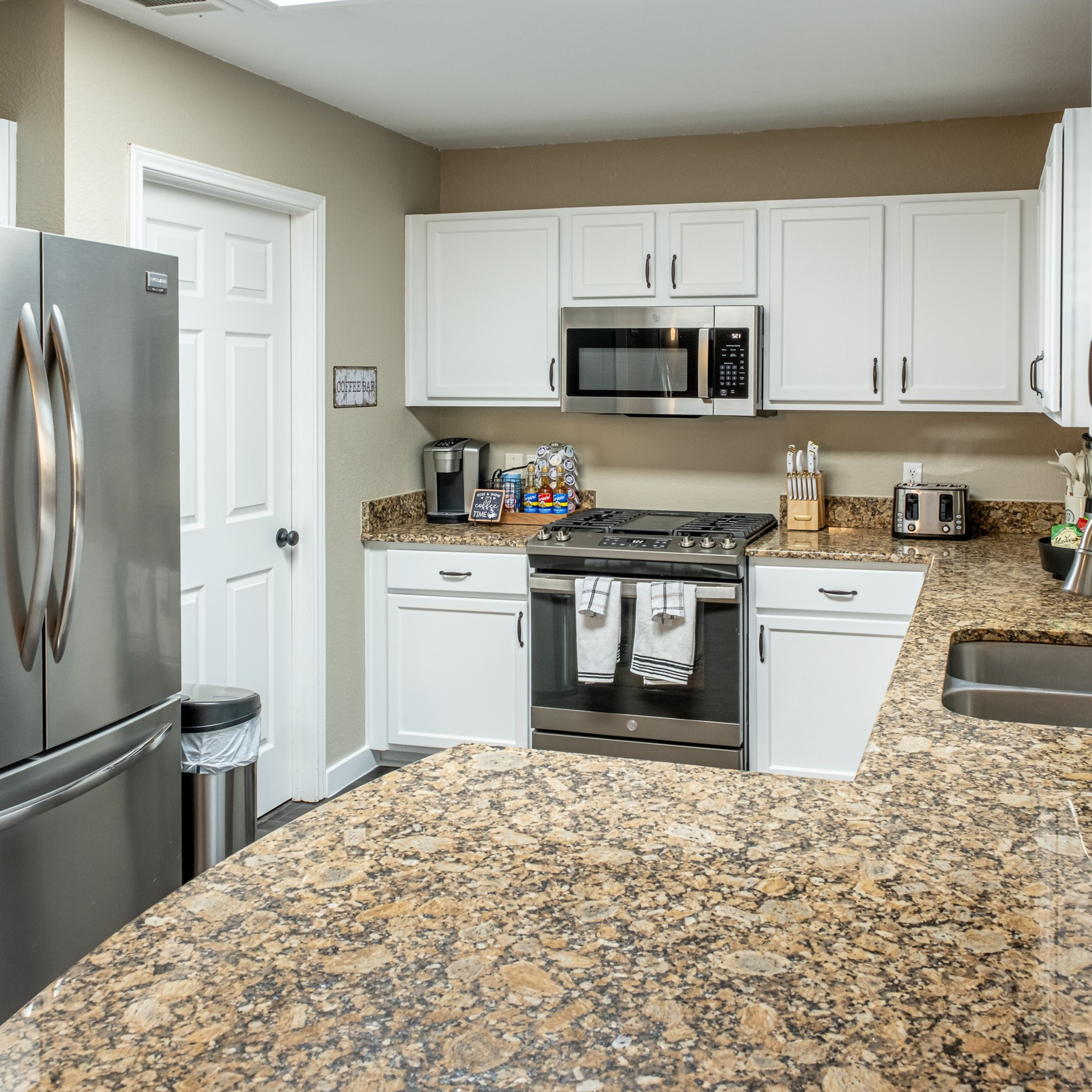Modern white kitchen interior photographed by Austin Texas interior photographer
