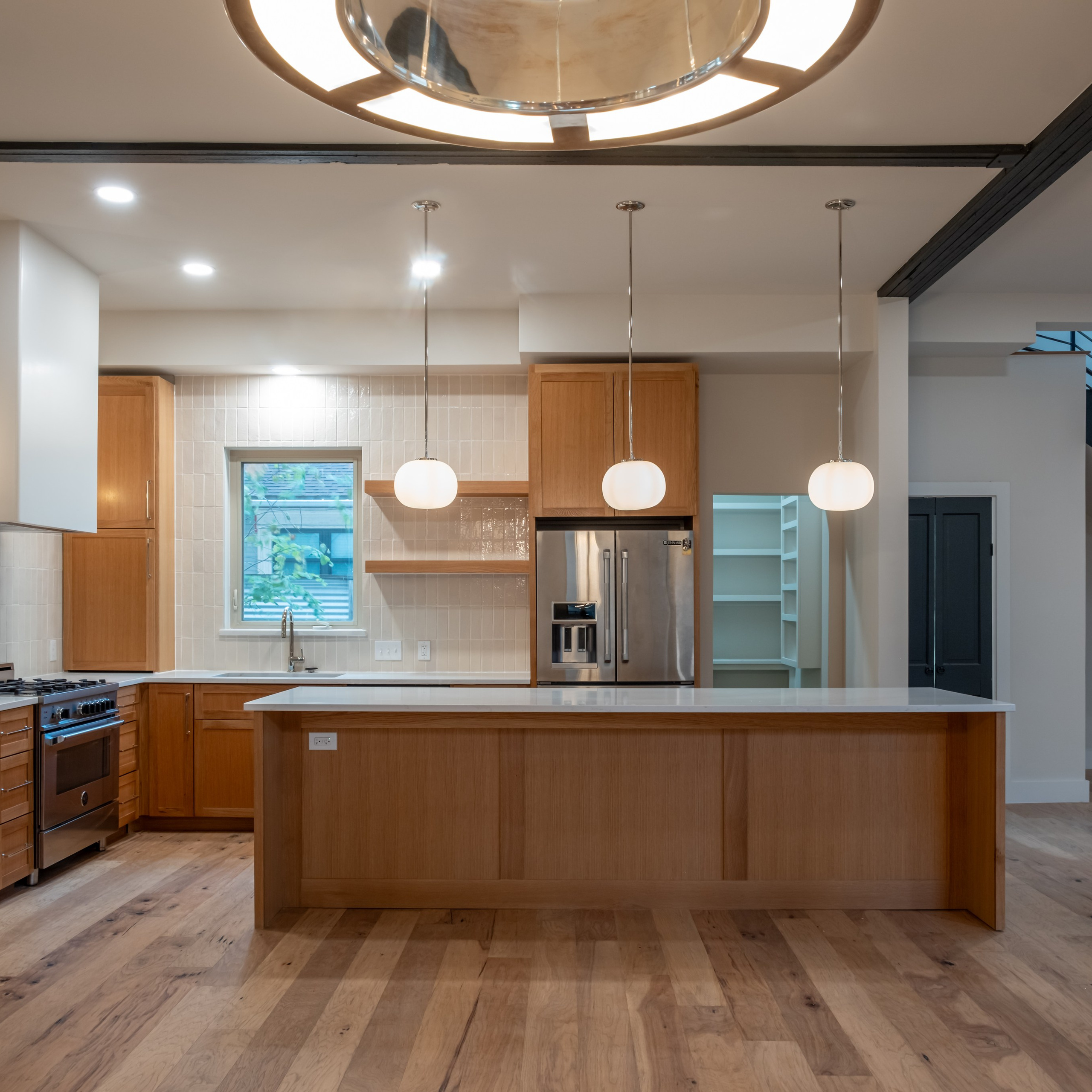 Modern white kitchen interior photographed by Austin Texas interior photographer