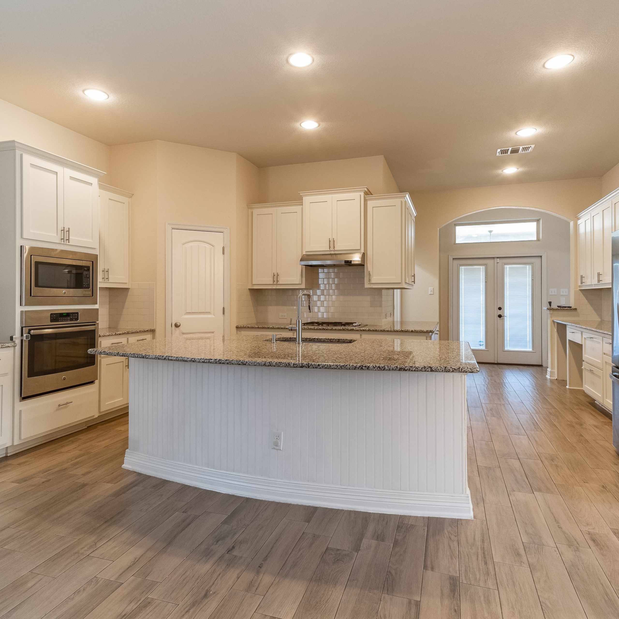 Modern white kitchen interior photographed by Austin Texas interior photographer