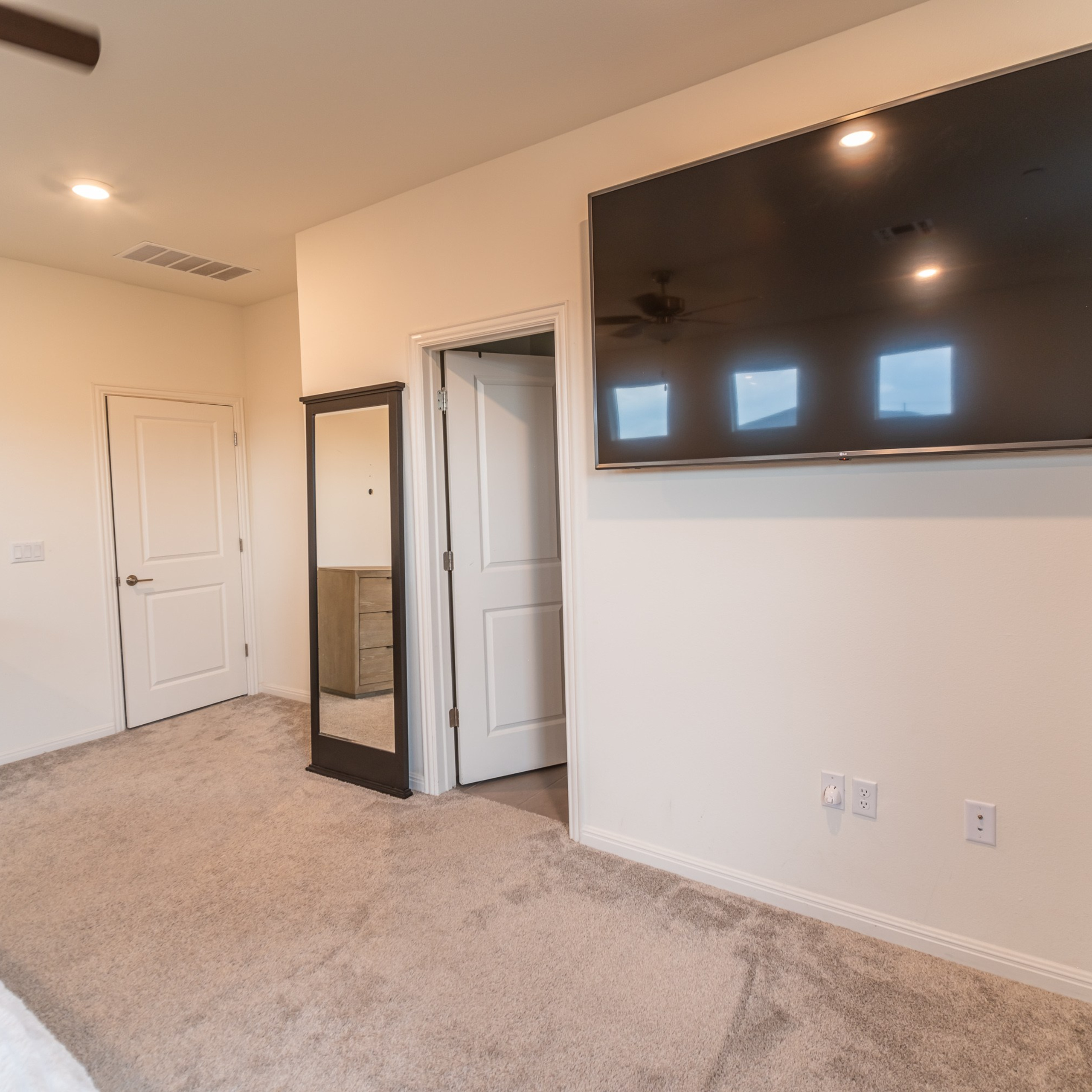 Cozy modern bedroom interior natural light Austin interior photographer