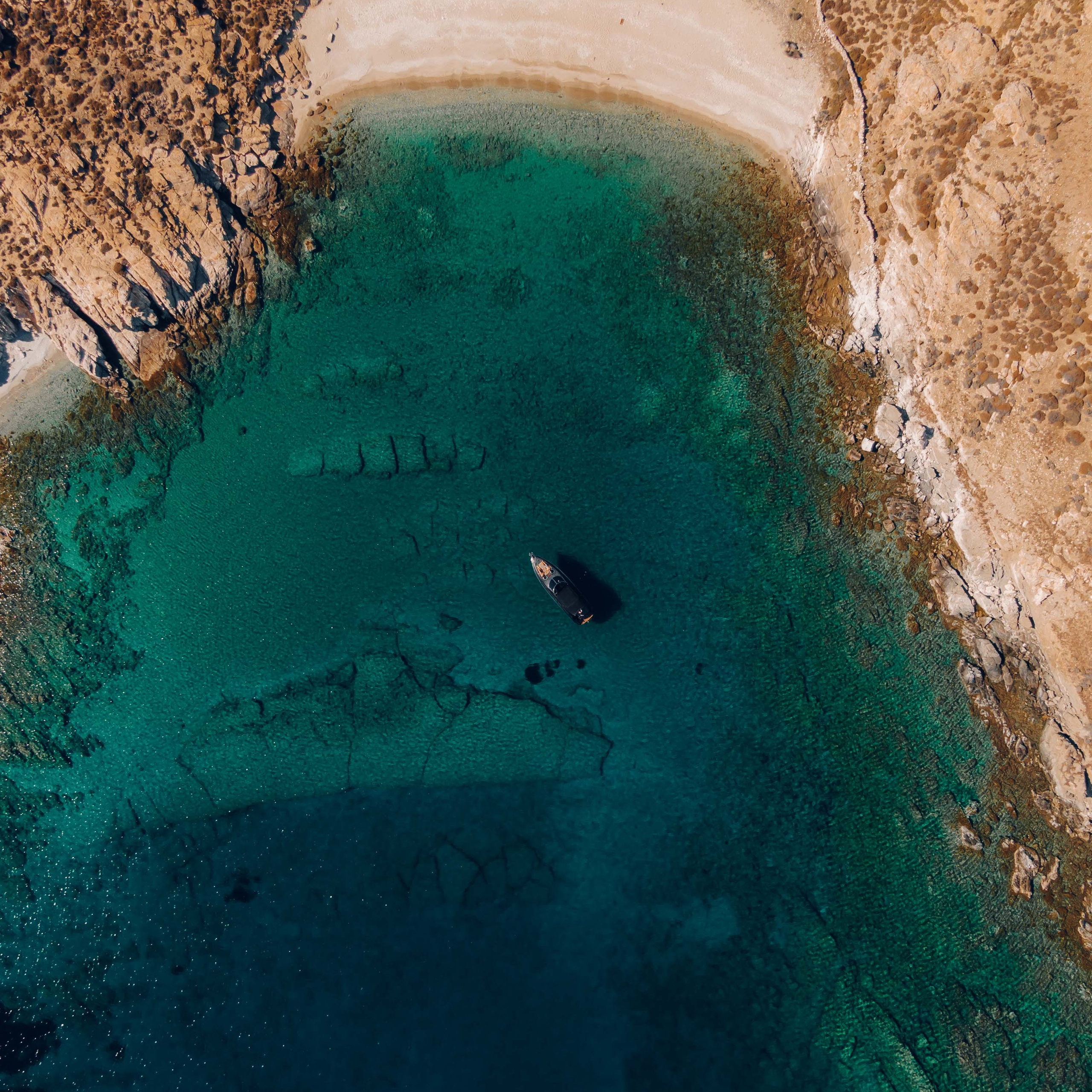 Luxury yacht drone and lifestyle photography capturing elegant details and sea experience.