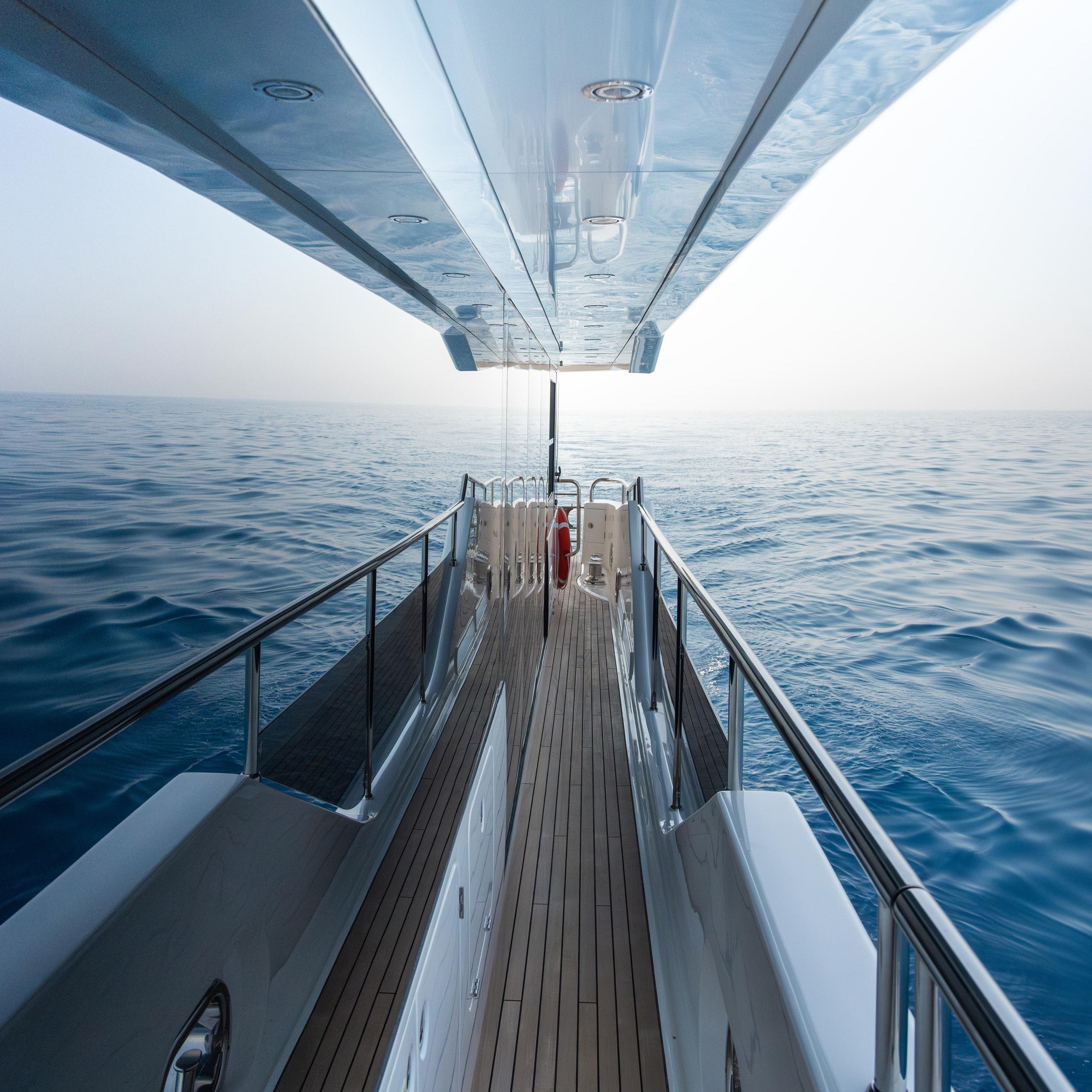 Luxury yacht drone and lifestyle photography capturing elegant details and sea experience.