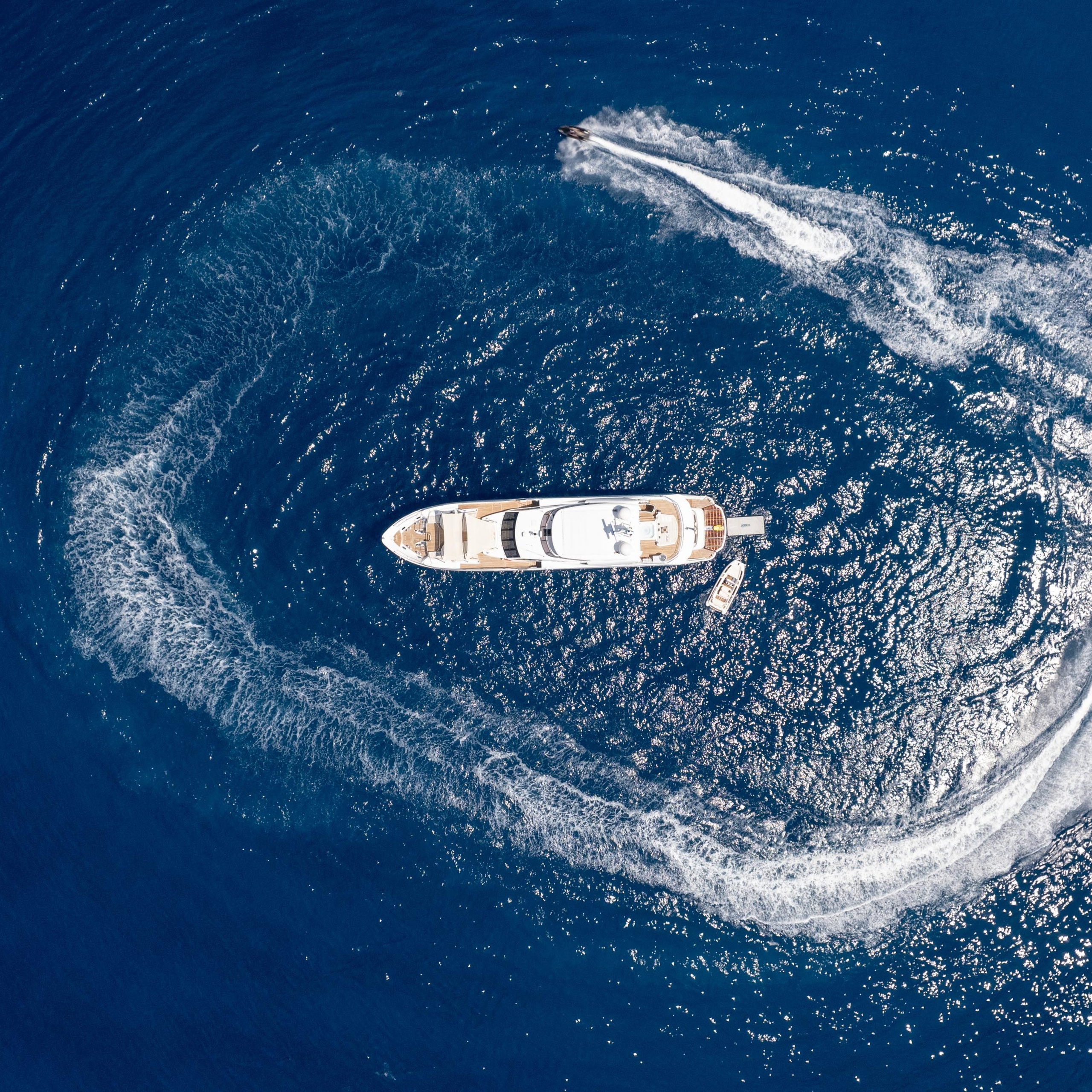 Luxury yacht drone and lifestyle photography capturing elegant details and sea experience.