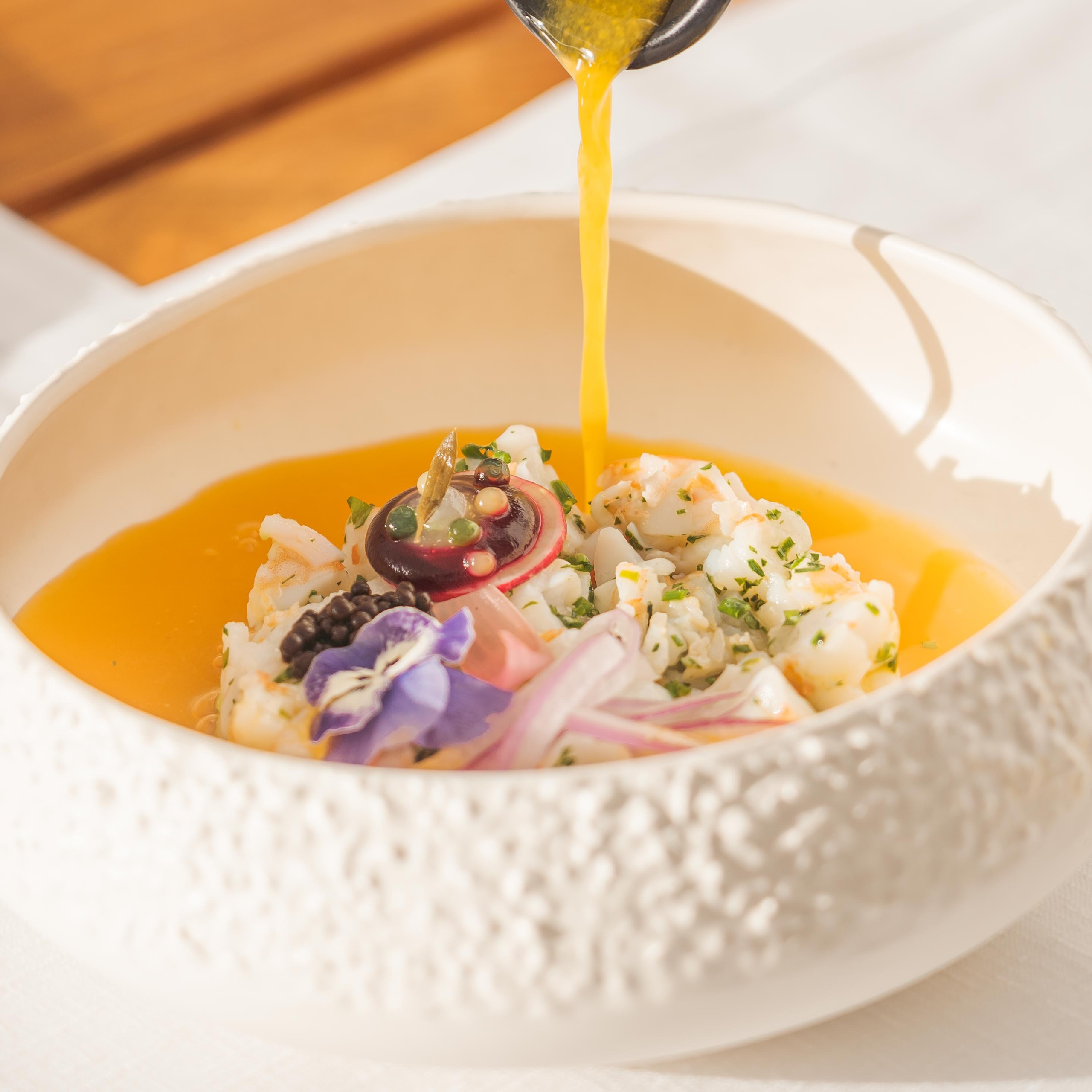 Professional food photography capturing gourmet dishes, creative food styling, and authentic dining experiences with a luxury aesthetic.