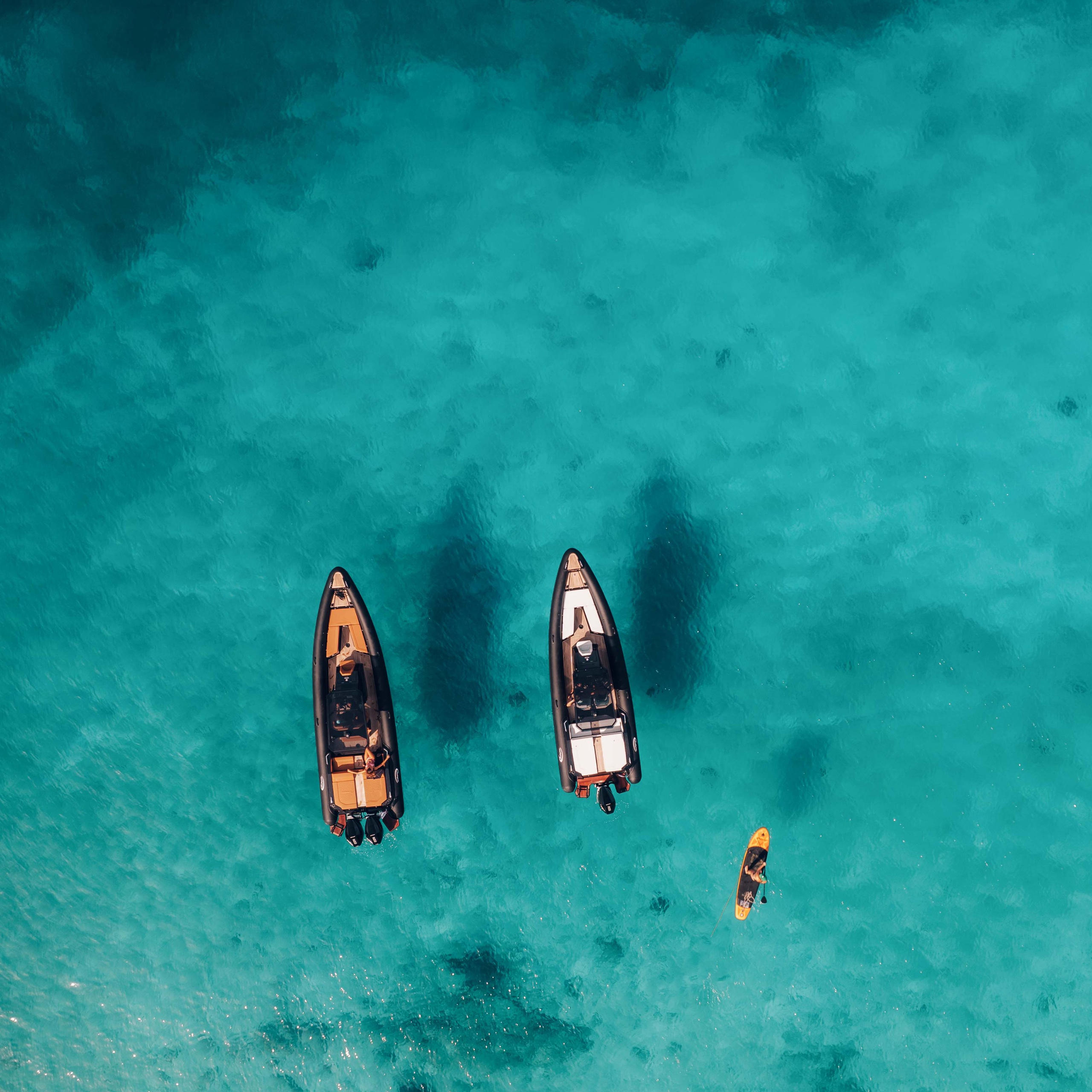 Luxury yacht drone and lifestyle photography capturing elegant details and sea experience.