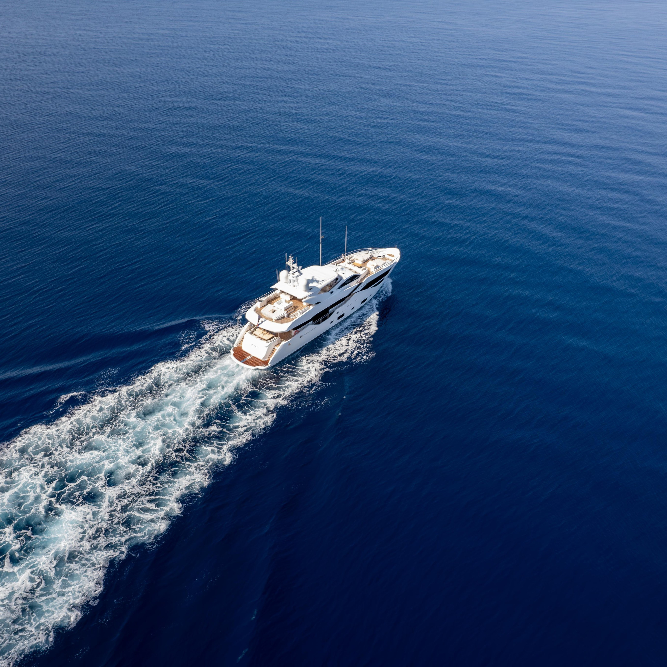 Luxury yacht drone and lifestyle photography capturing elegant details and sea experience.