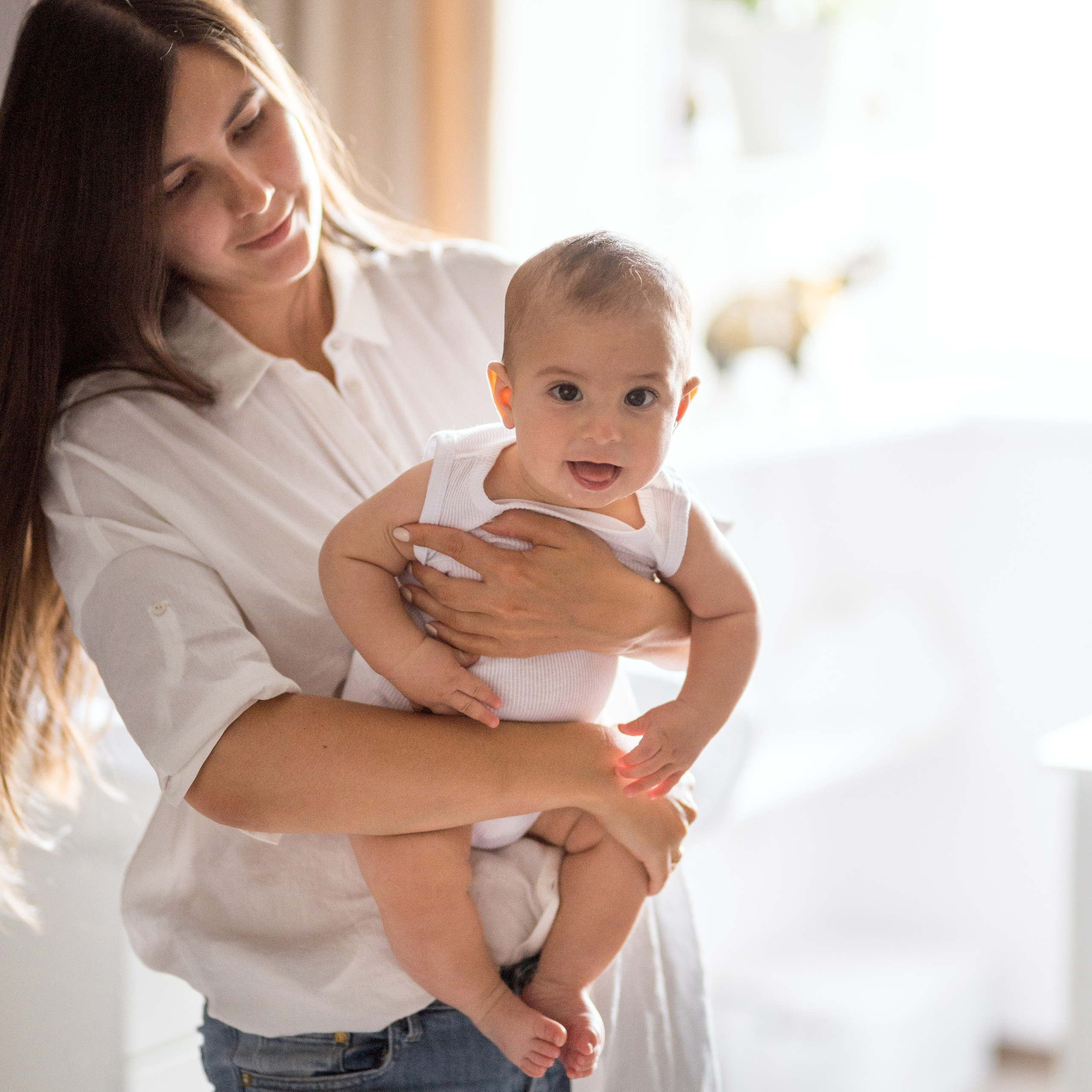 Photo session of a mother with a baby
