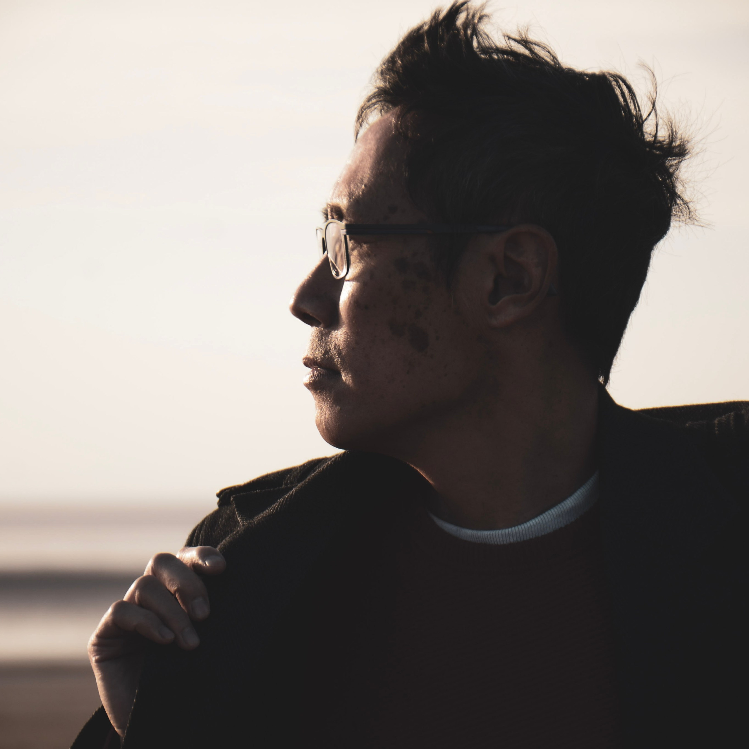 Black and white portrait photographer Solihull, minimalist male portrait natural light