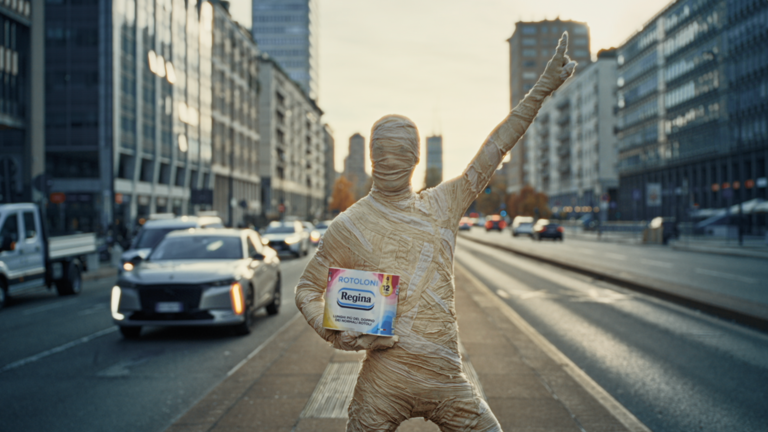 A John Travolta mummy dance-shopping to Bee Gee`s Staying alive for a newer and cleaner wrap.