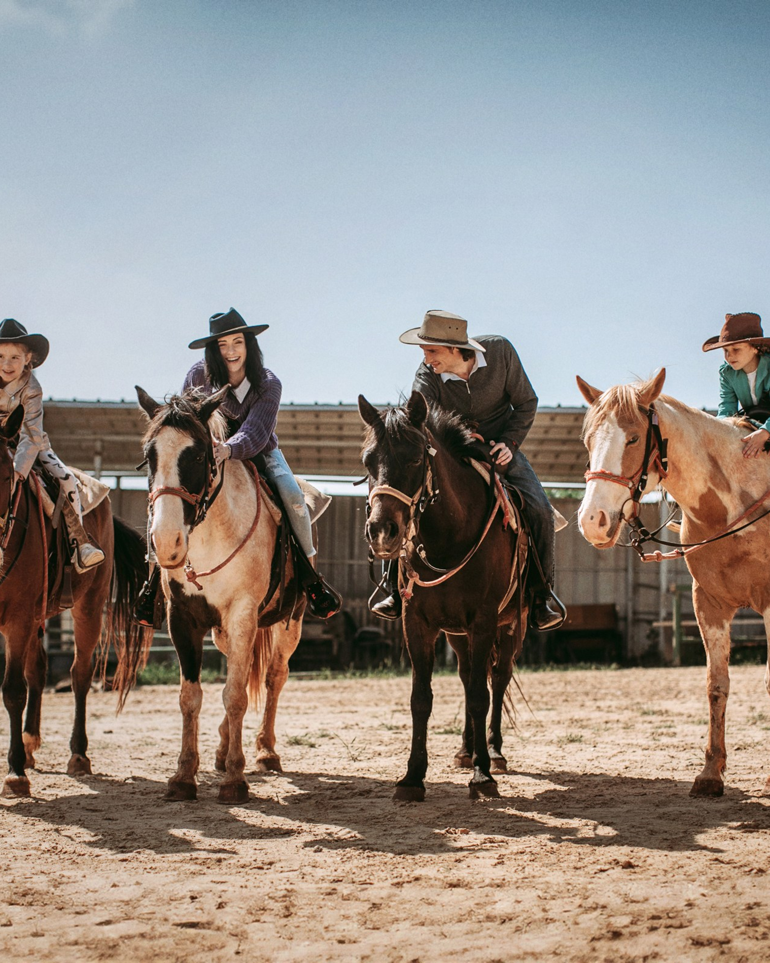 Family riding horses through the hills of Mount Carmel, near Beit Oren