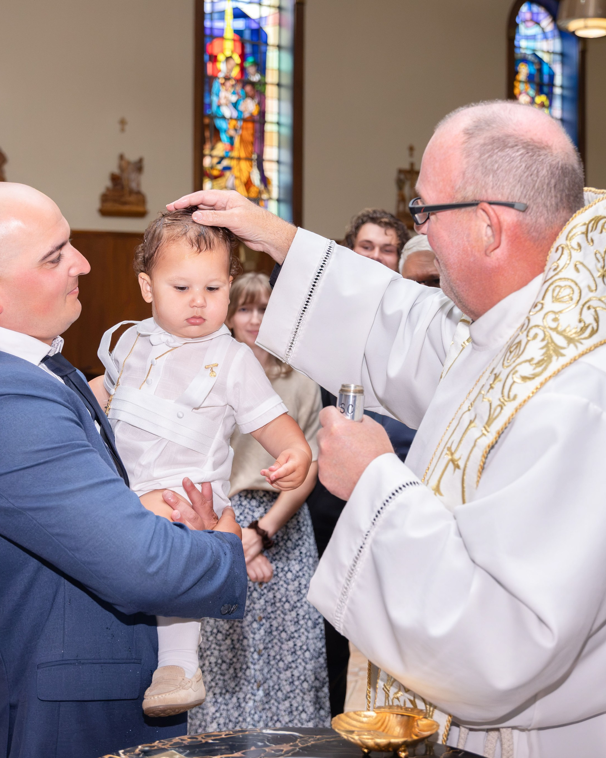 A Little Boy’s Catholic Baptism