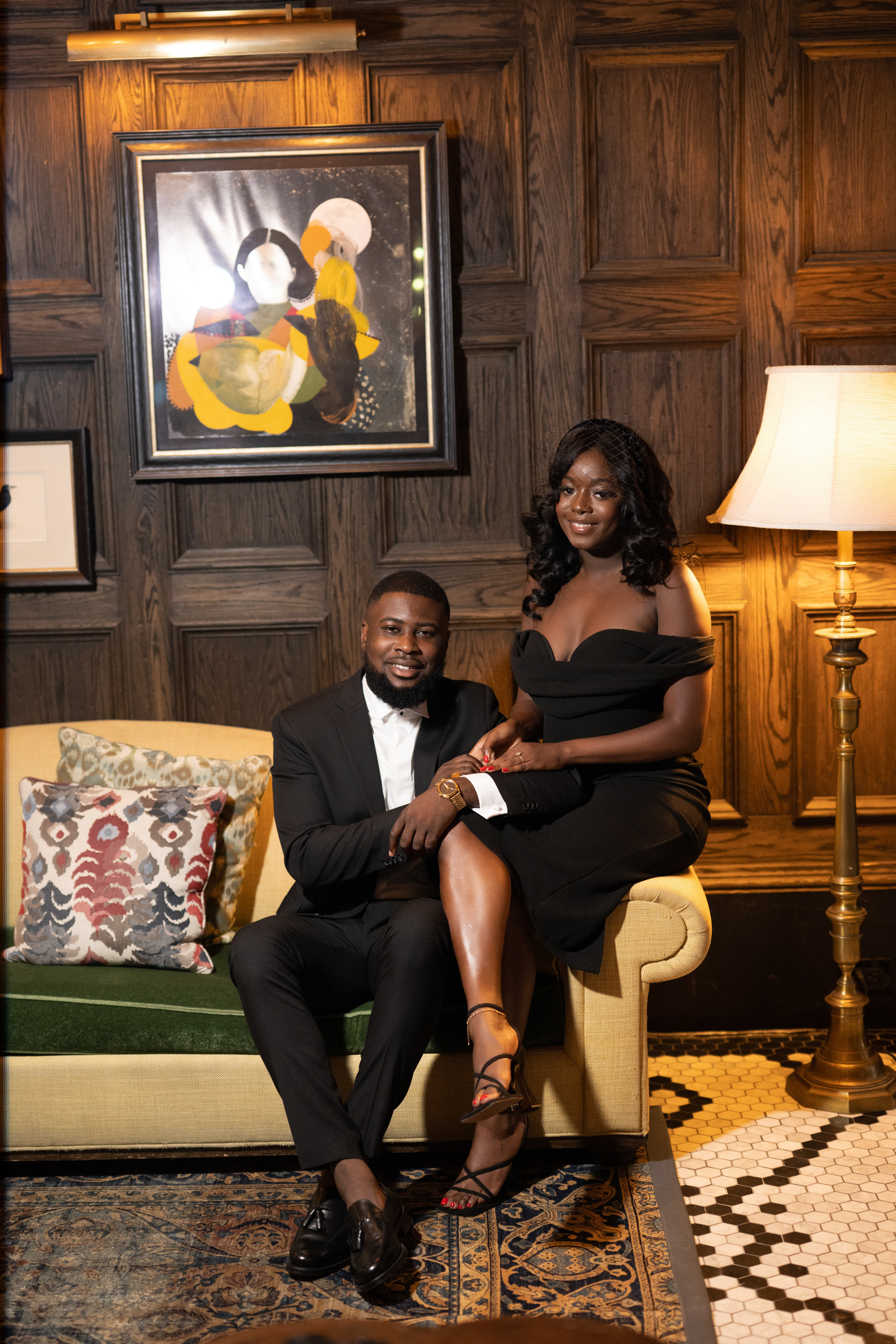 a man and woman sitting on a couch