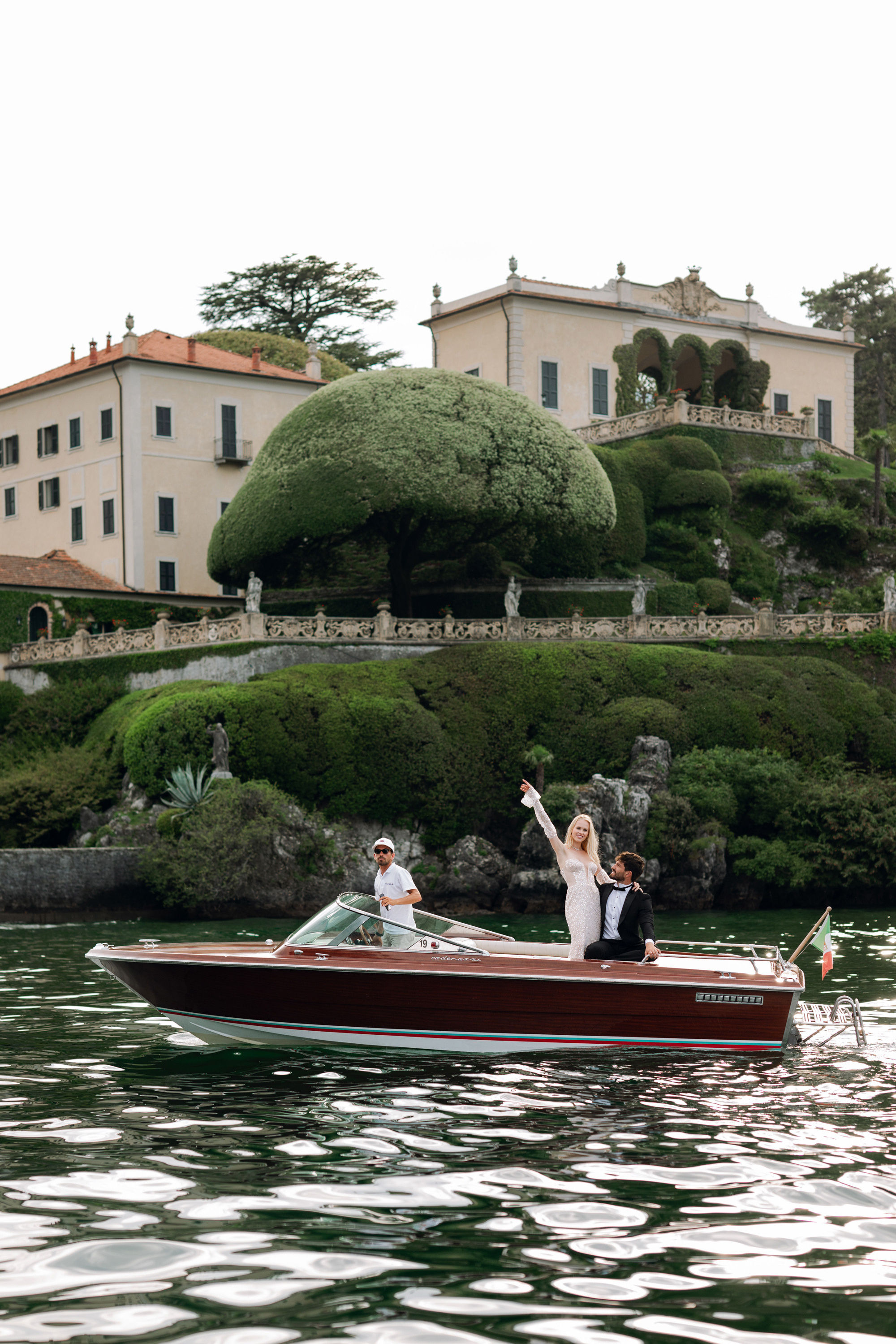 a couple in a boat on a lake