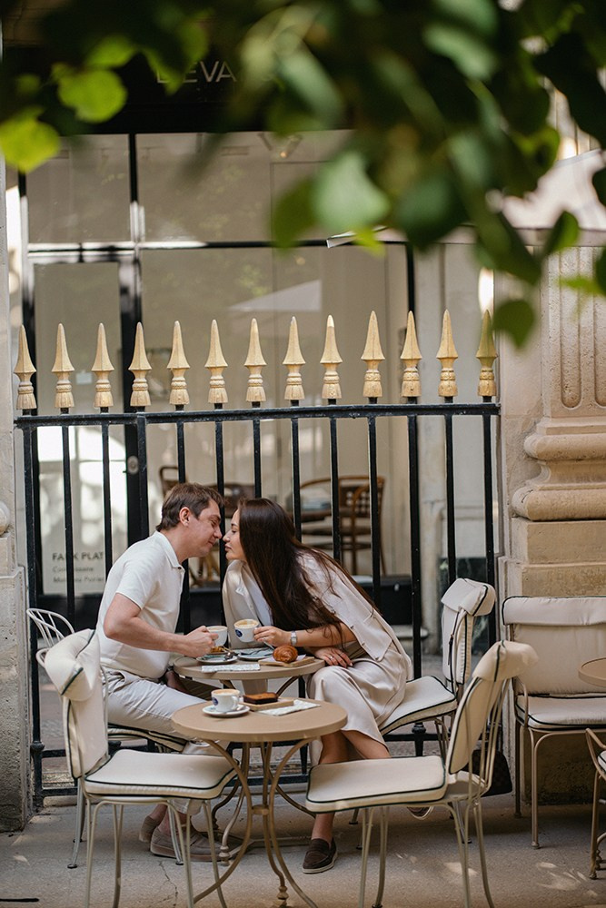 Café terrace during a Paris couple photoshoot