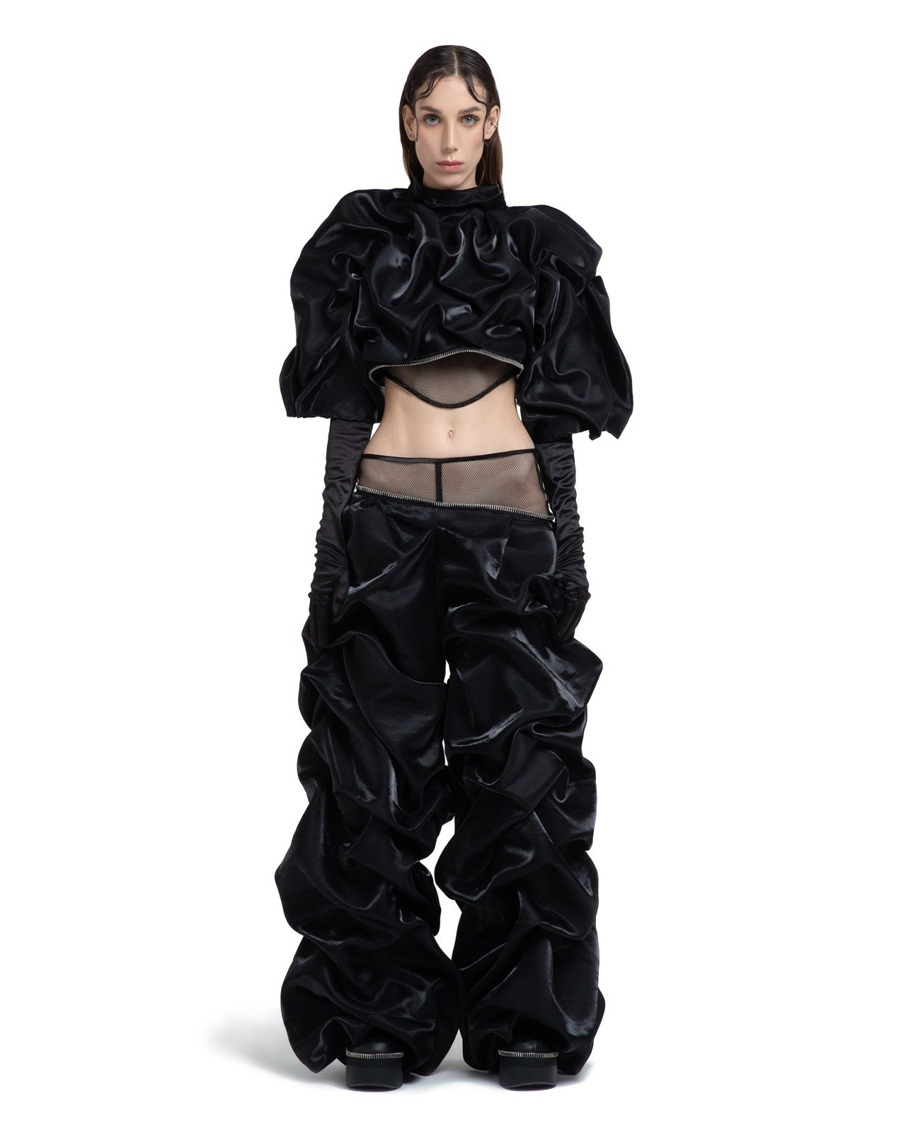 Model wearing a black outfit for consistent ecommerce fashion photography in Dubai