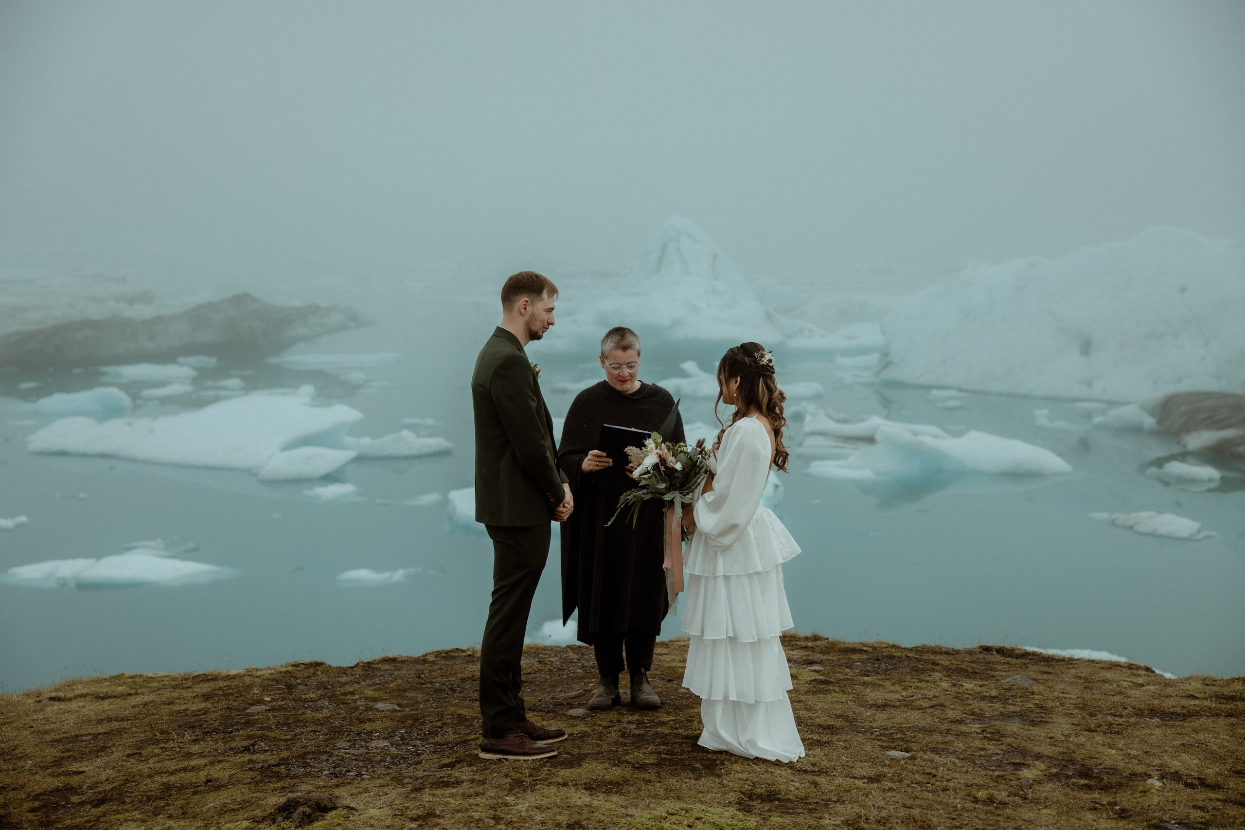 What to pack for Iceland elopement: ultimate Iceland elopement packing list. Destination wedding elopement photographer videographer