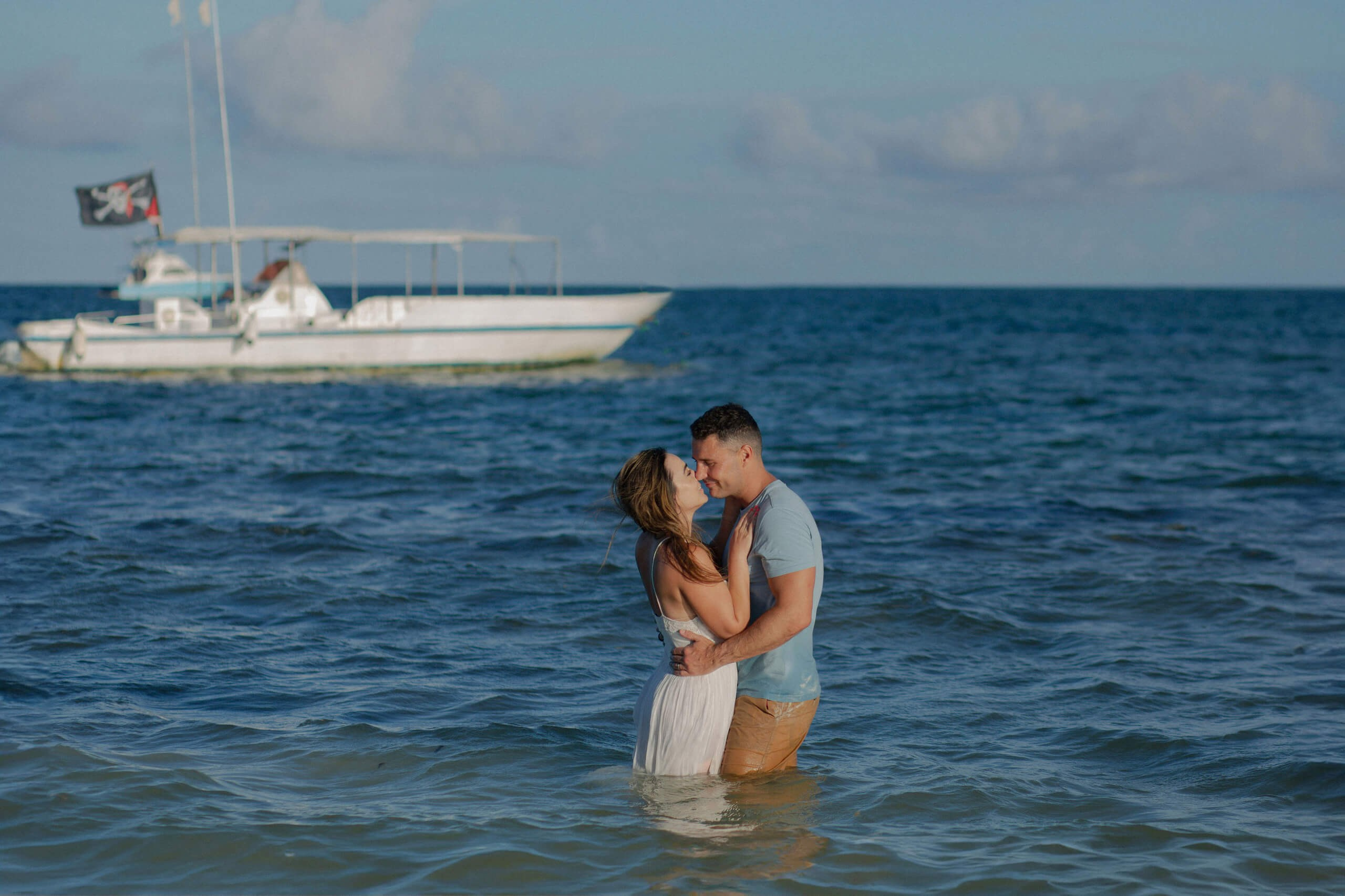 Diani Beach couple portraits with fishing boat background, Kenya love story.