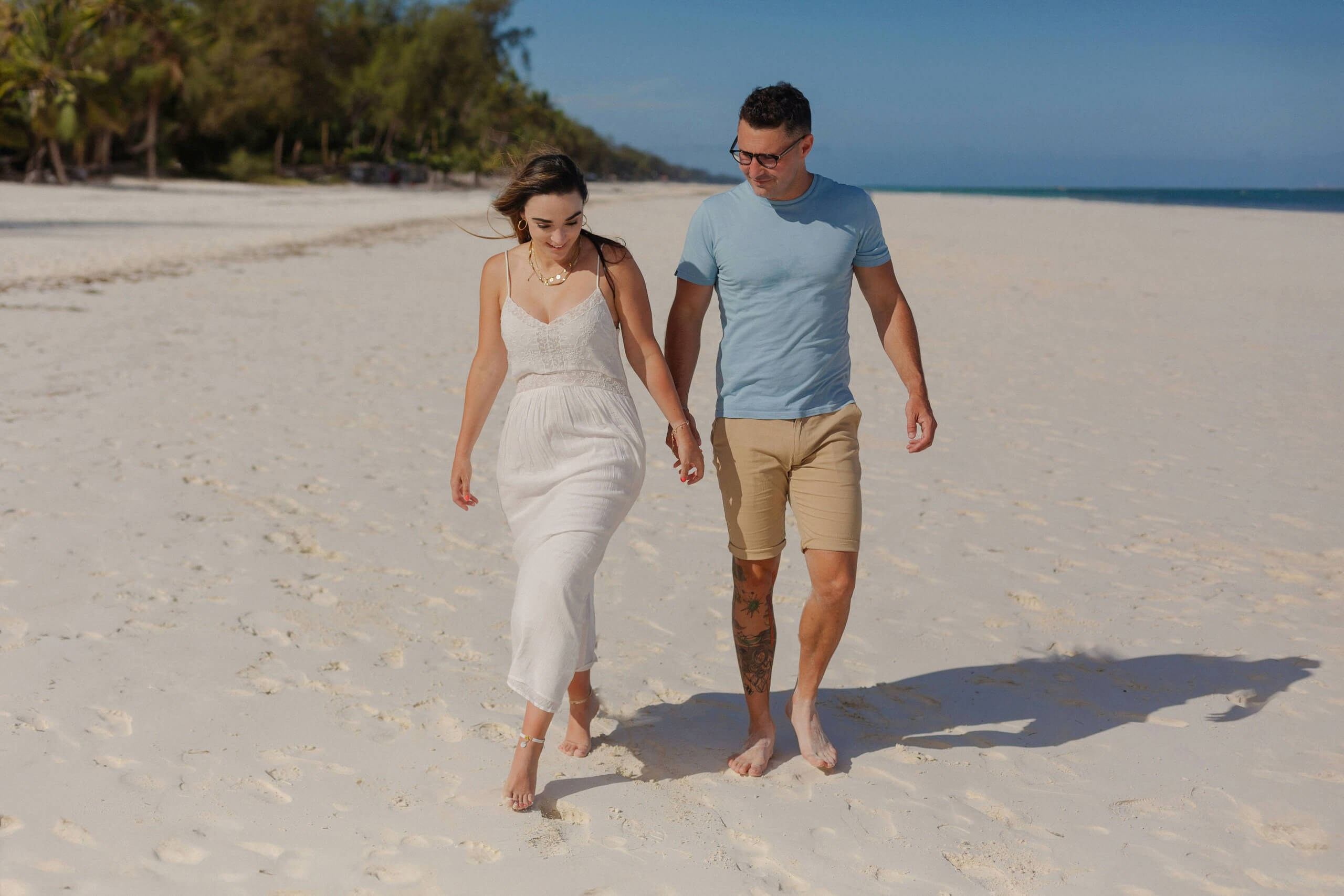 Kenya couple portrait on the sand during golden hour.