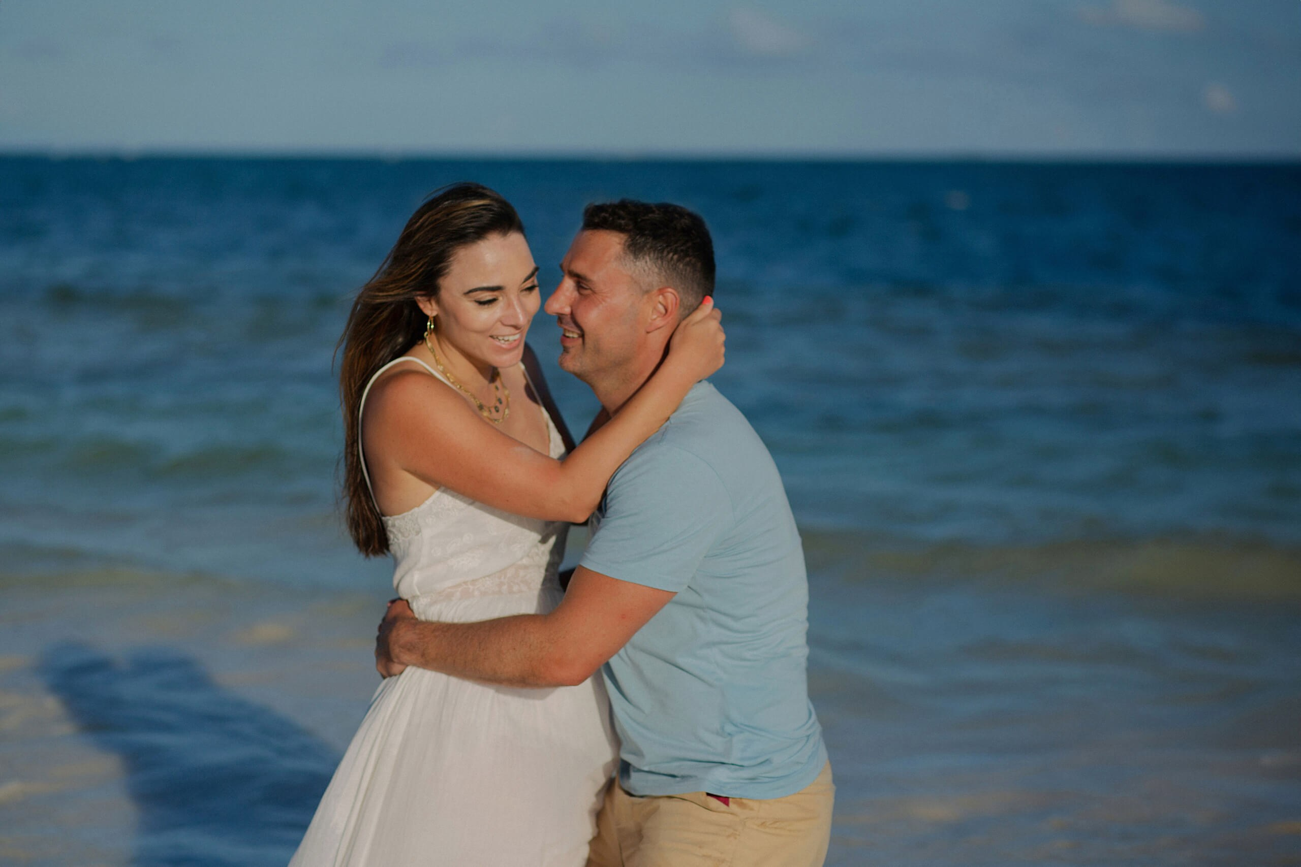 Mombasa romantic embrace on the shore, Kenya pre-wedding session.