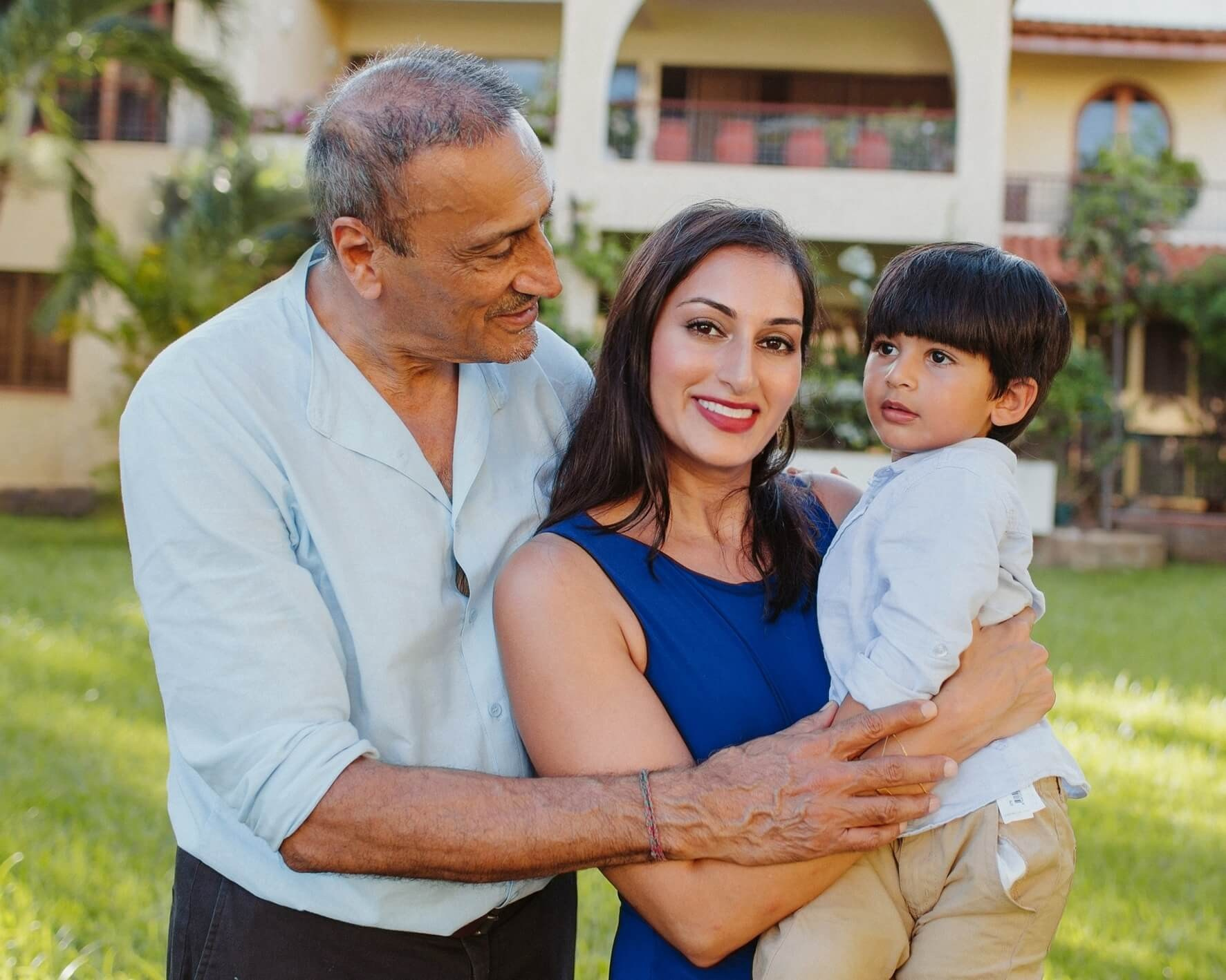 Captivating family image filled with sunshine, smiles, and movement—showcasing connection and personality in a Mombasa, Kenya session.