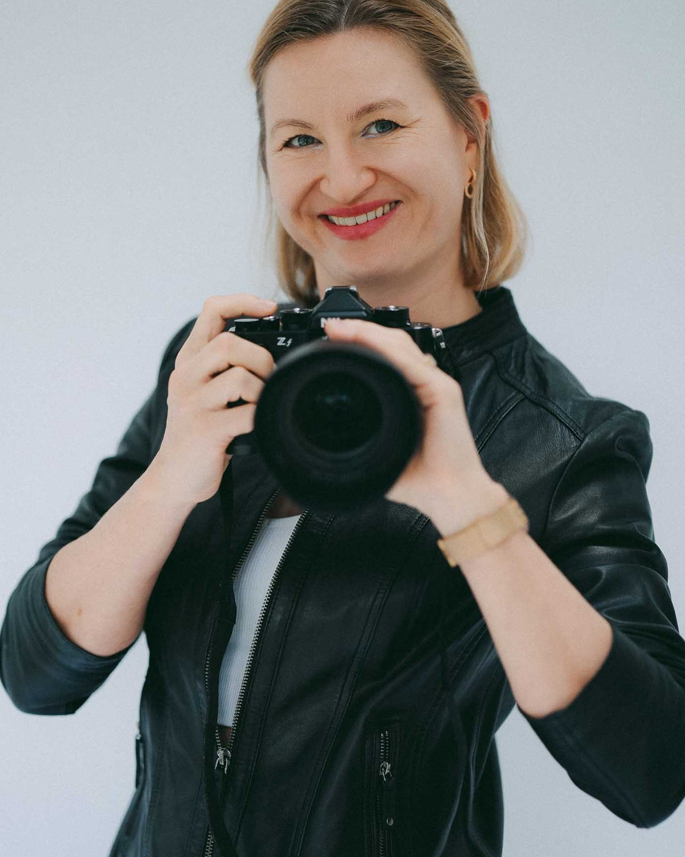 Photographer Irina Zoteeva Solihull, personal brand portrait with camera