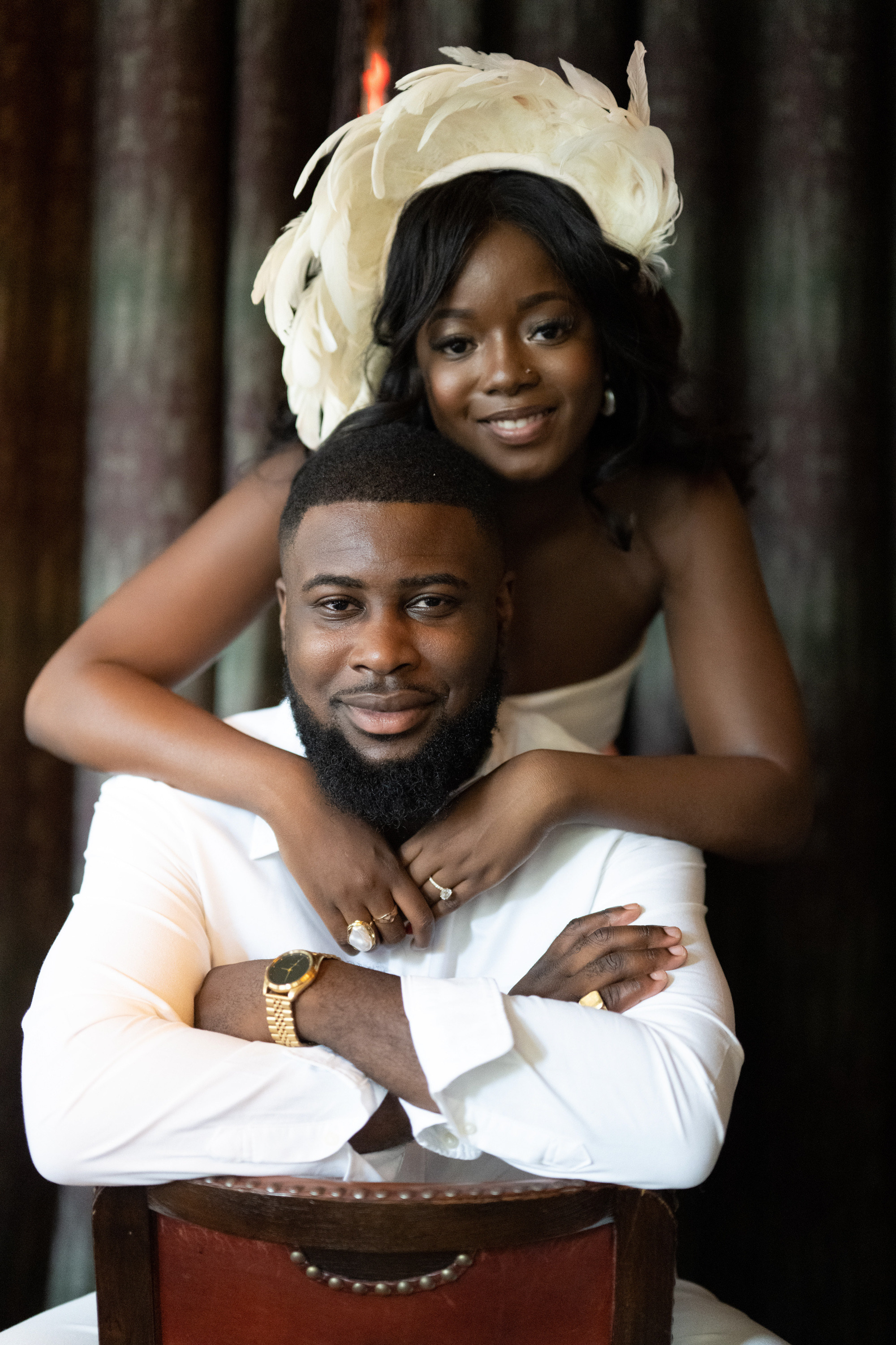 a man and woman are posing for a picture