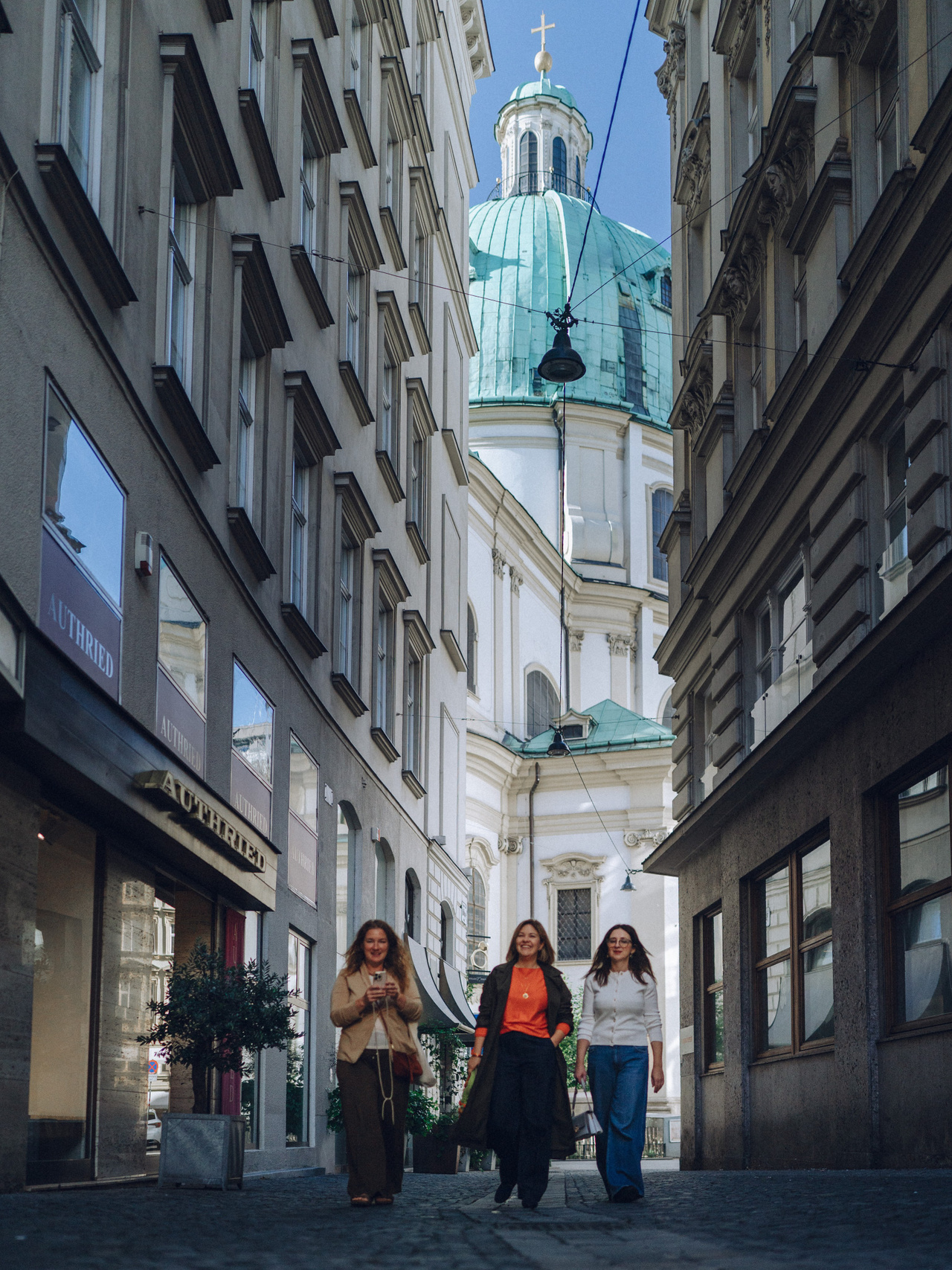 A small group walking together in Vienna