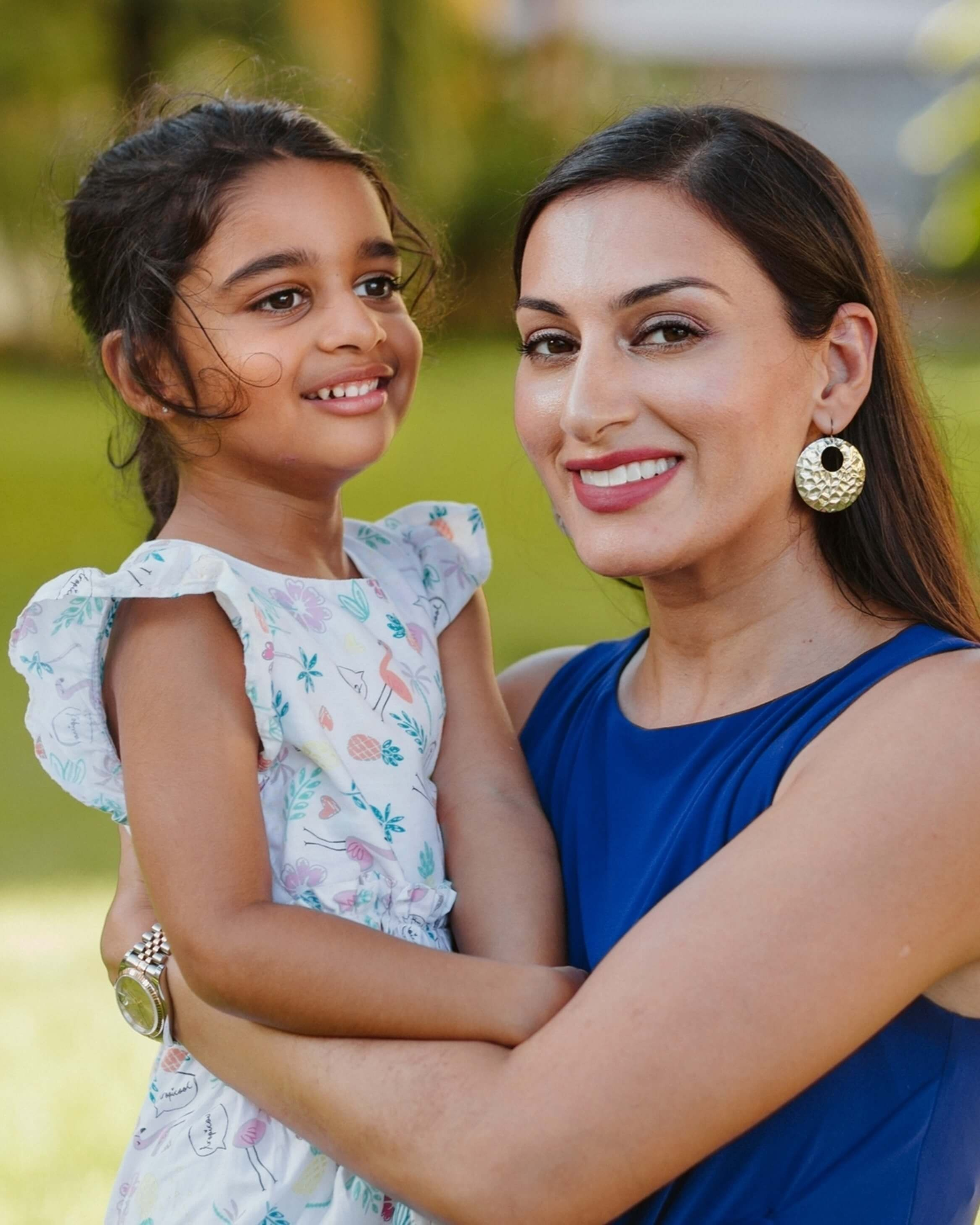 An expressive portrait of a mother and daughter sharing a meaningful look, taken during a photography session in Mombasa, Kenya.