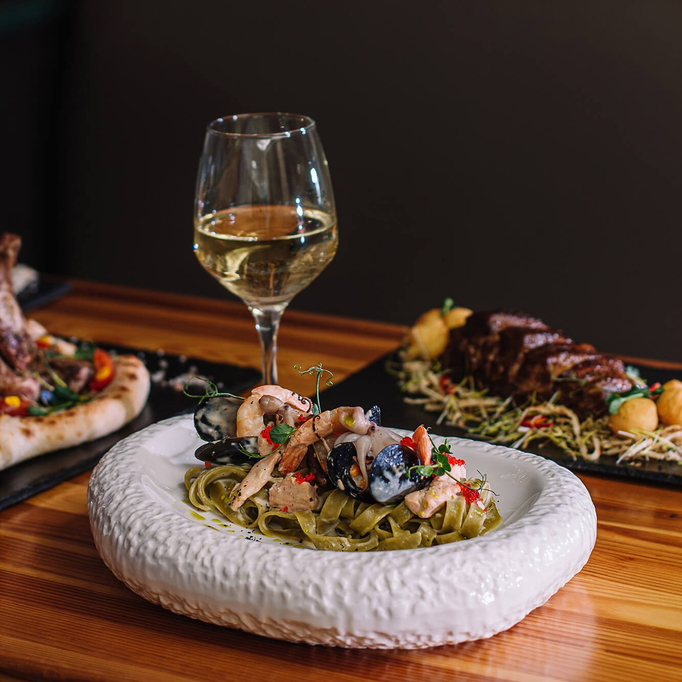 Juicy gourmet burger with melted cheese and crispy fries, captured for a fast food restaurant menu in Melbourne.