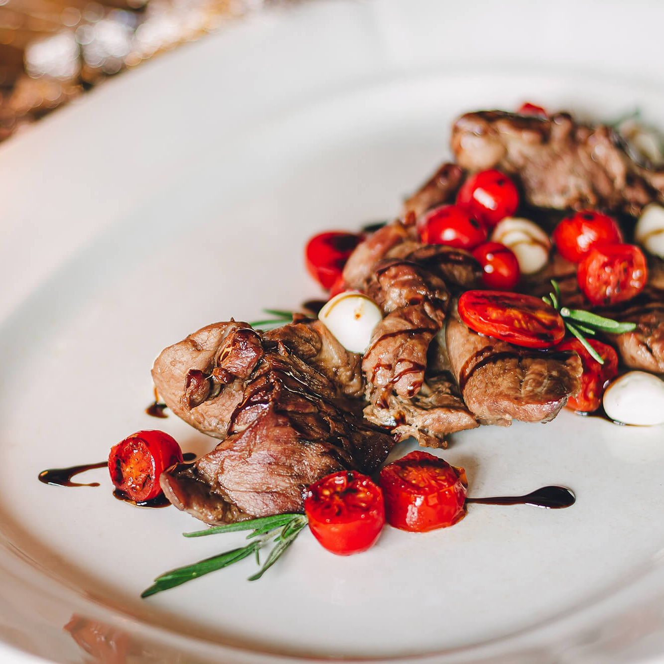 Elegant dessert photography featuring a strawberry cheesecake with fresh fruit garnish in Melbourne.