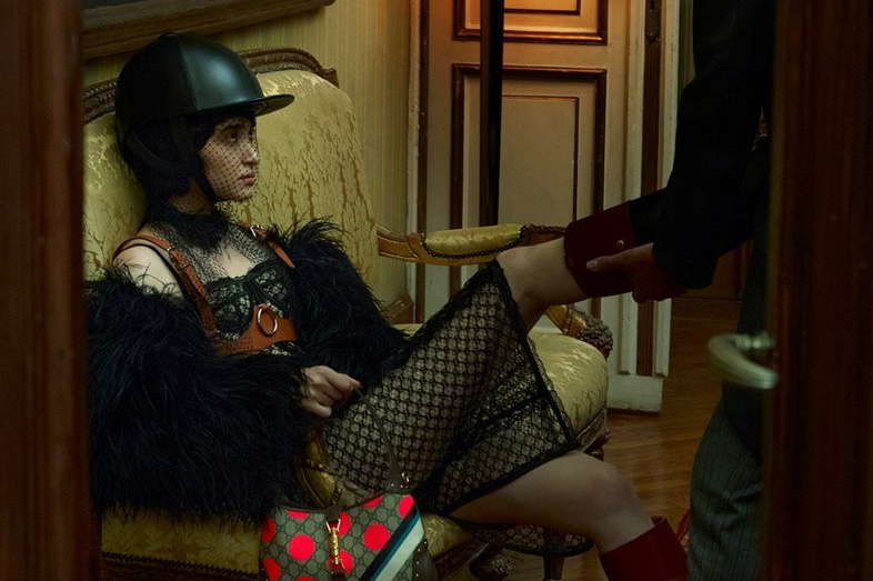 Editorial-style cinematic portrait inspired by the Gucci Aria campaign, featuring dramatic lighting and high-fashion luxury storytelling.