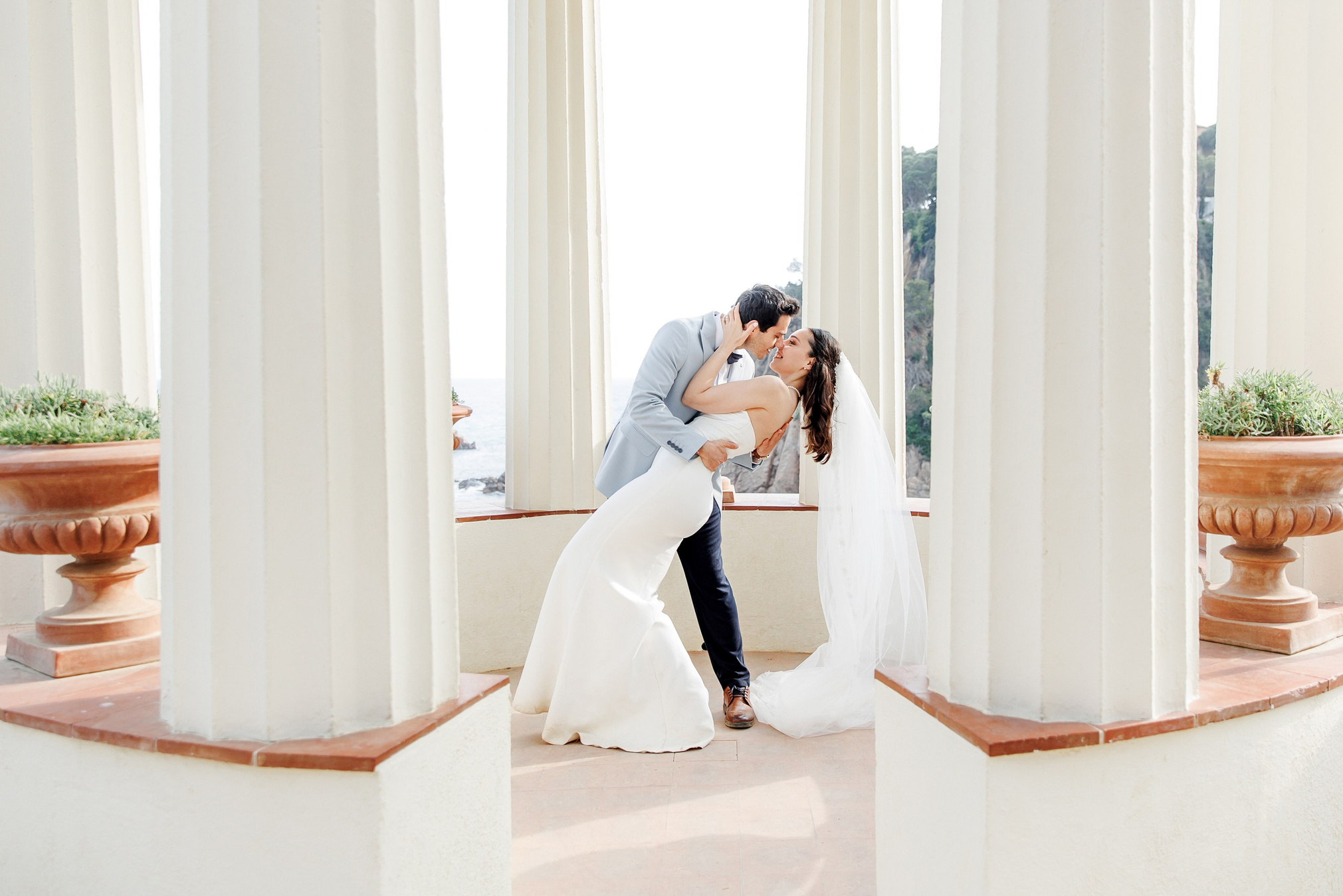 Elegant outdoor wedding ceremony in Barcelona, showcasing the city's iconic Seaview