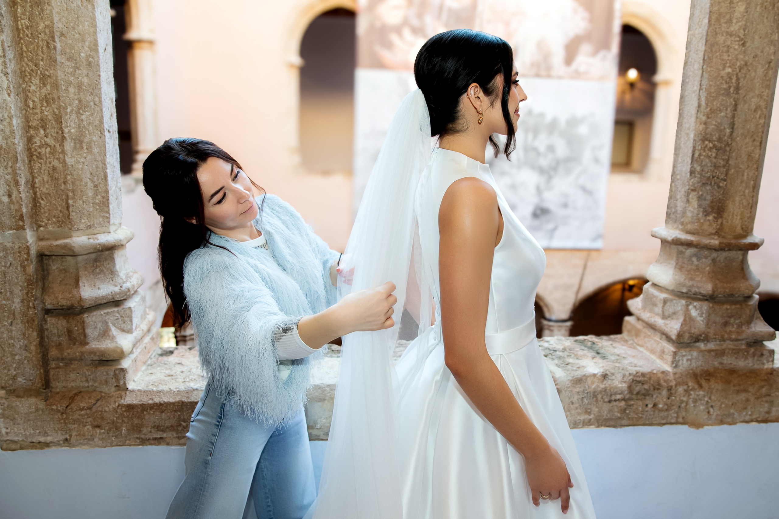 bridal preparation in Valencia, Spain with bride getting ready in elegant interior before wedding ceremony