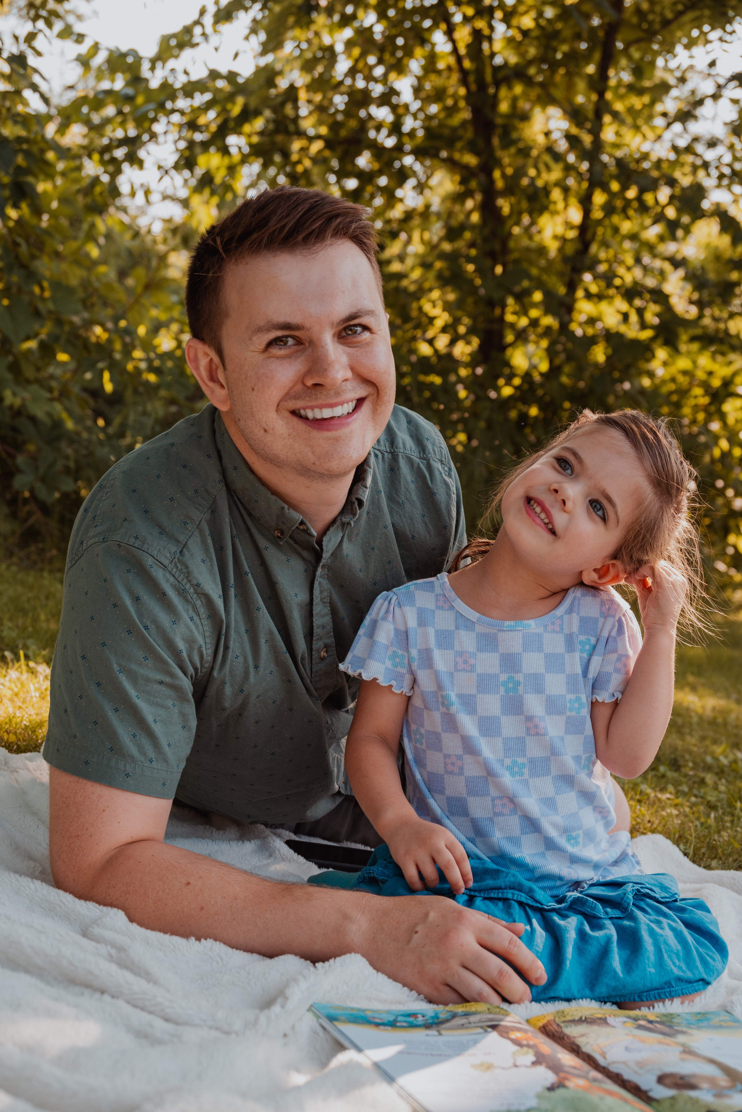 Professional portrait photographer in Wisconsin specializing in father-child photography. Natural light family portraits in Green Bay, Appleton, and Fox Valley capturing genuine connections.