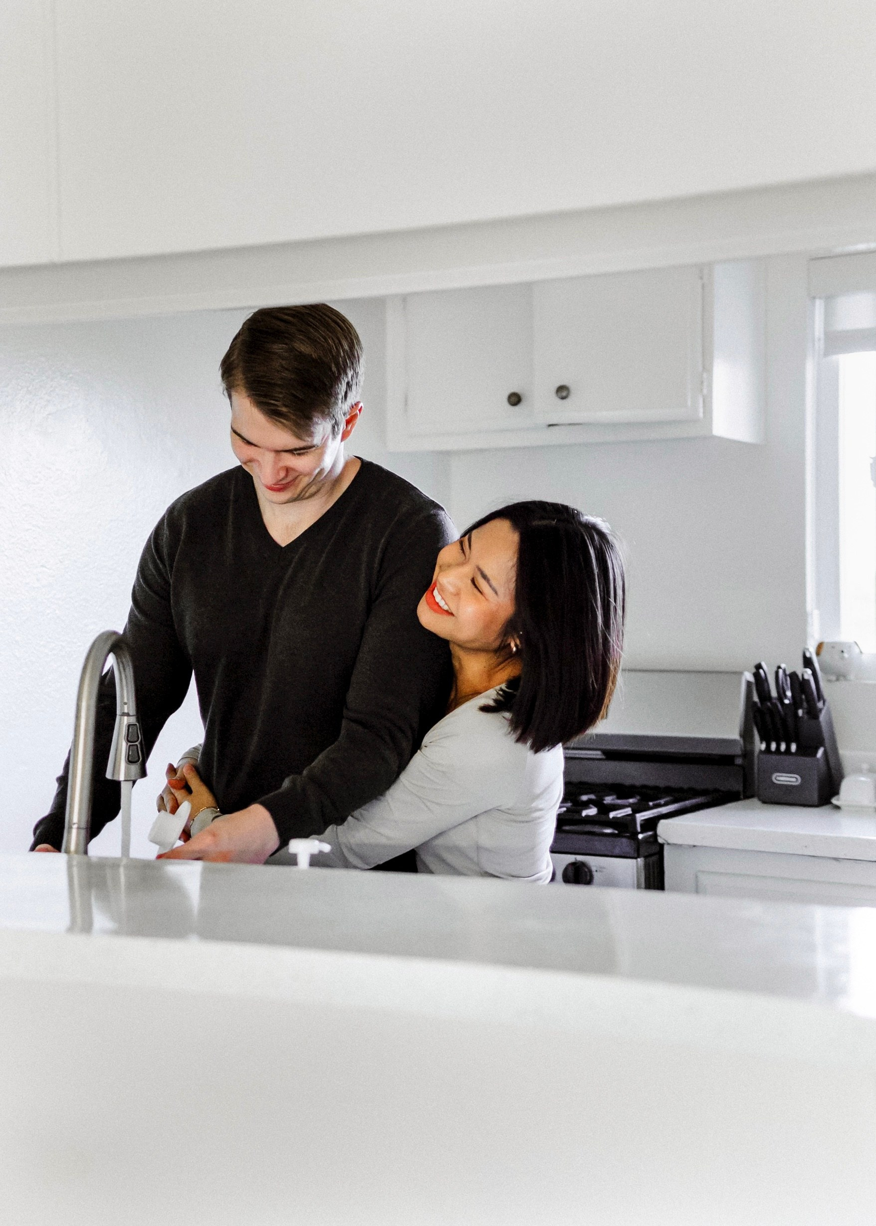 Everyday kitchen moment captured in natural couples photography