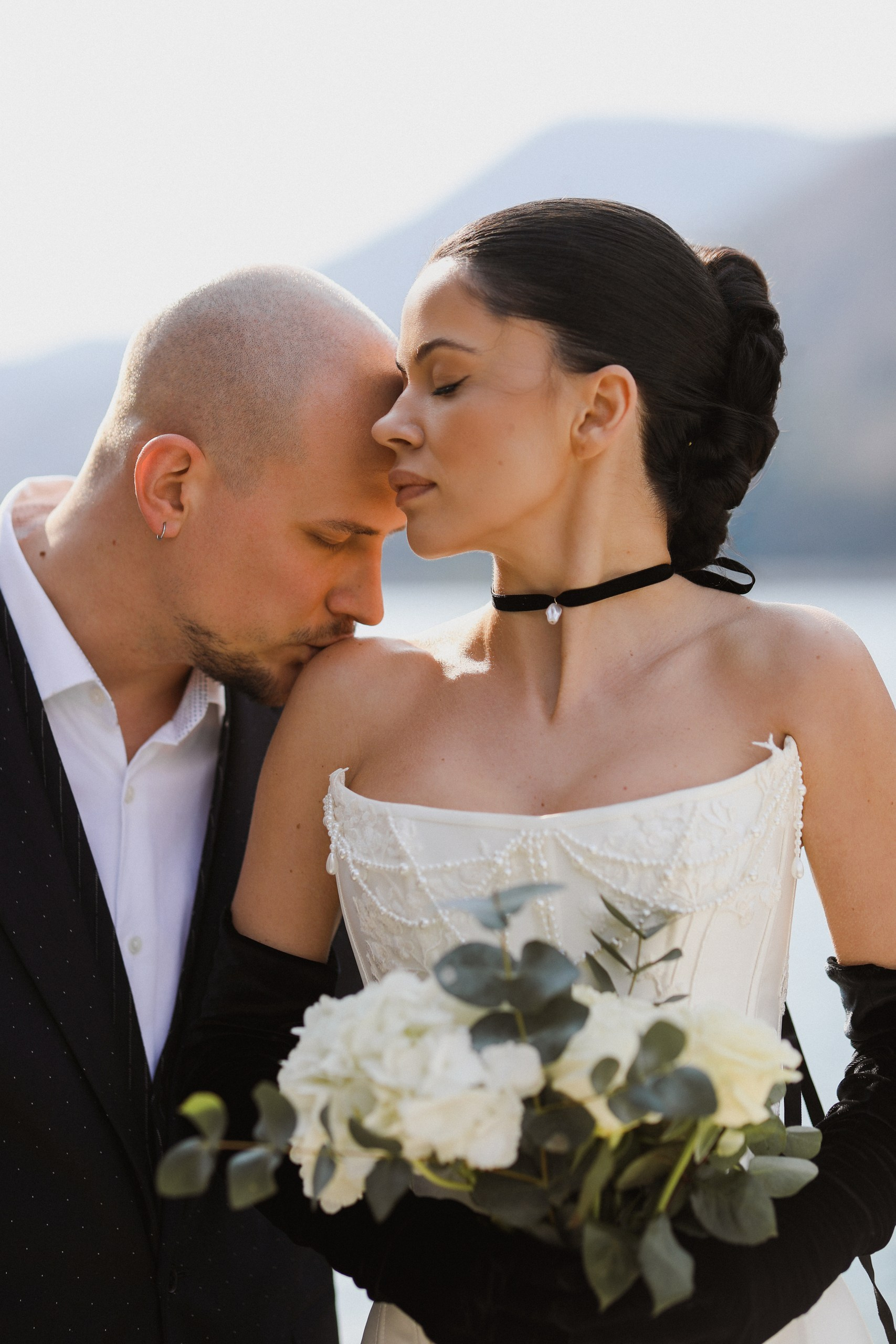 bride and groom staying by the sea, montenegro