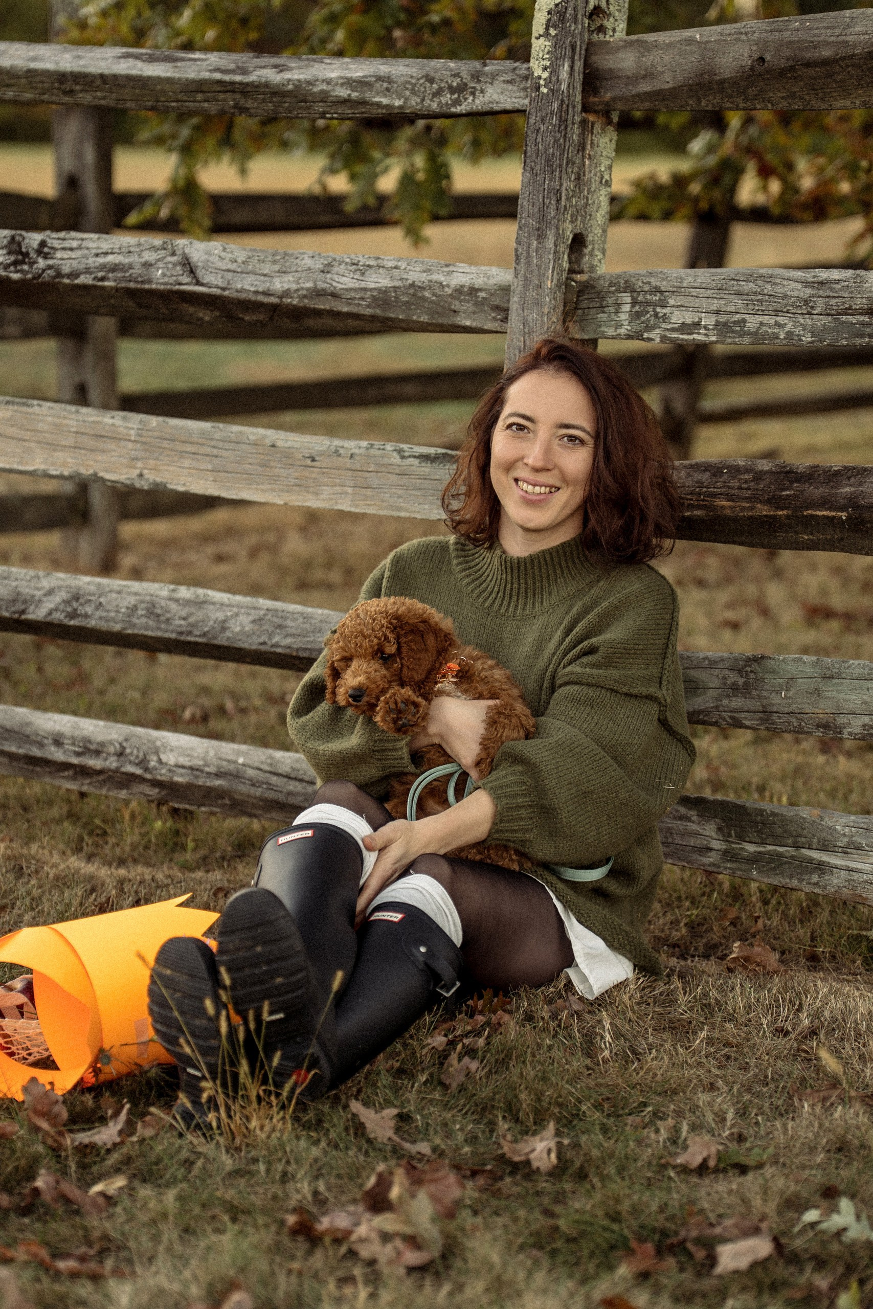 Family portrait of Alisa Tant with her husband and daughter enjoying time together outdoors in Bucks County, Pennsylvania.