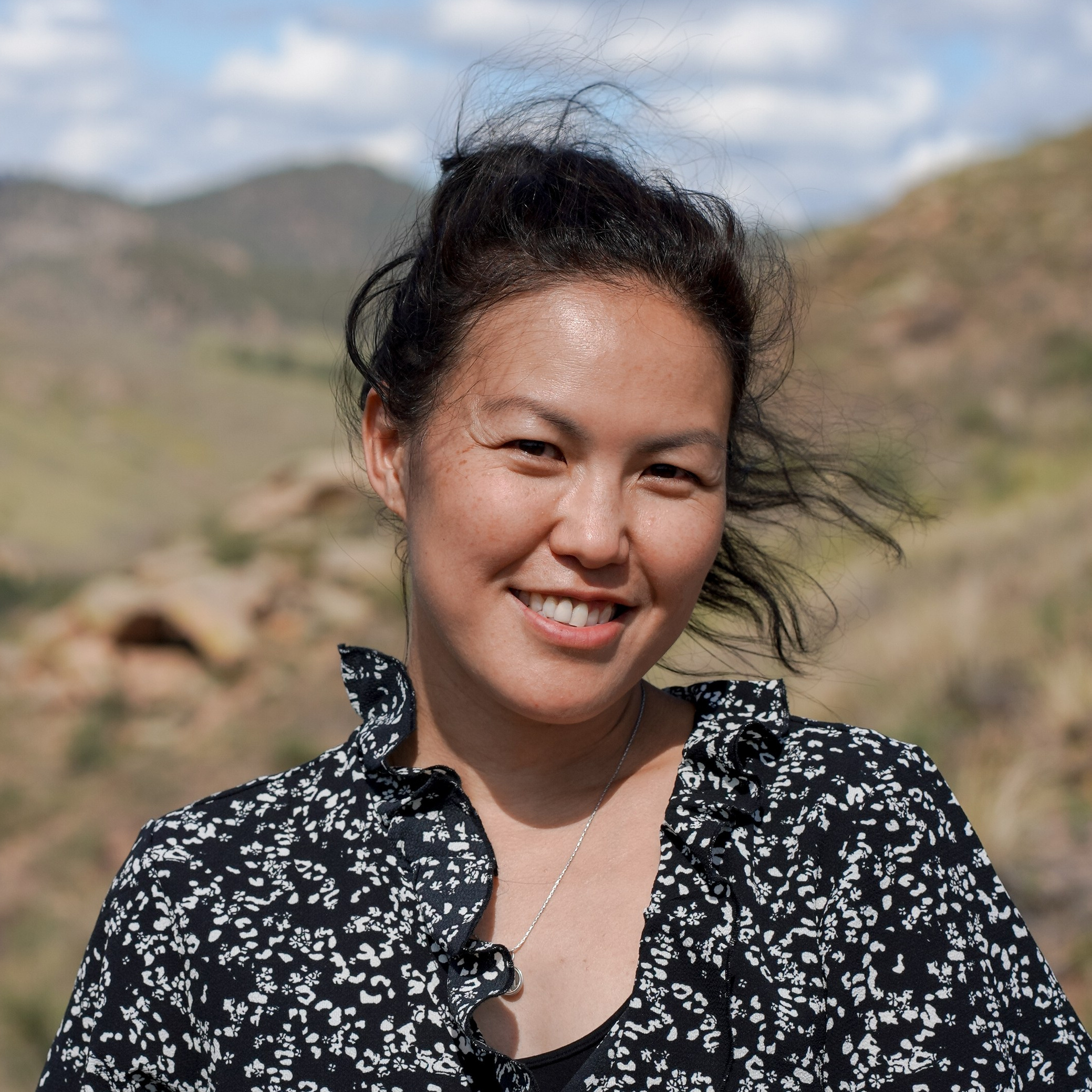 Outdoor Portrait of a Burnaby photographer with welcoming smile