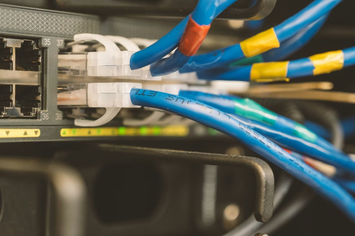 Ethernet cables connected to network equipment for a reliable event livestream