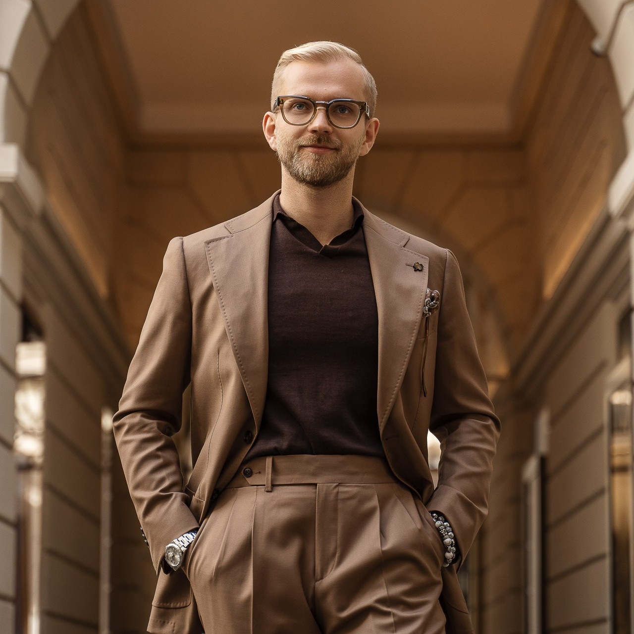 Portrait photoshoot for man in Milan with classic architecture and natural light