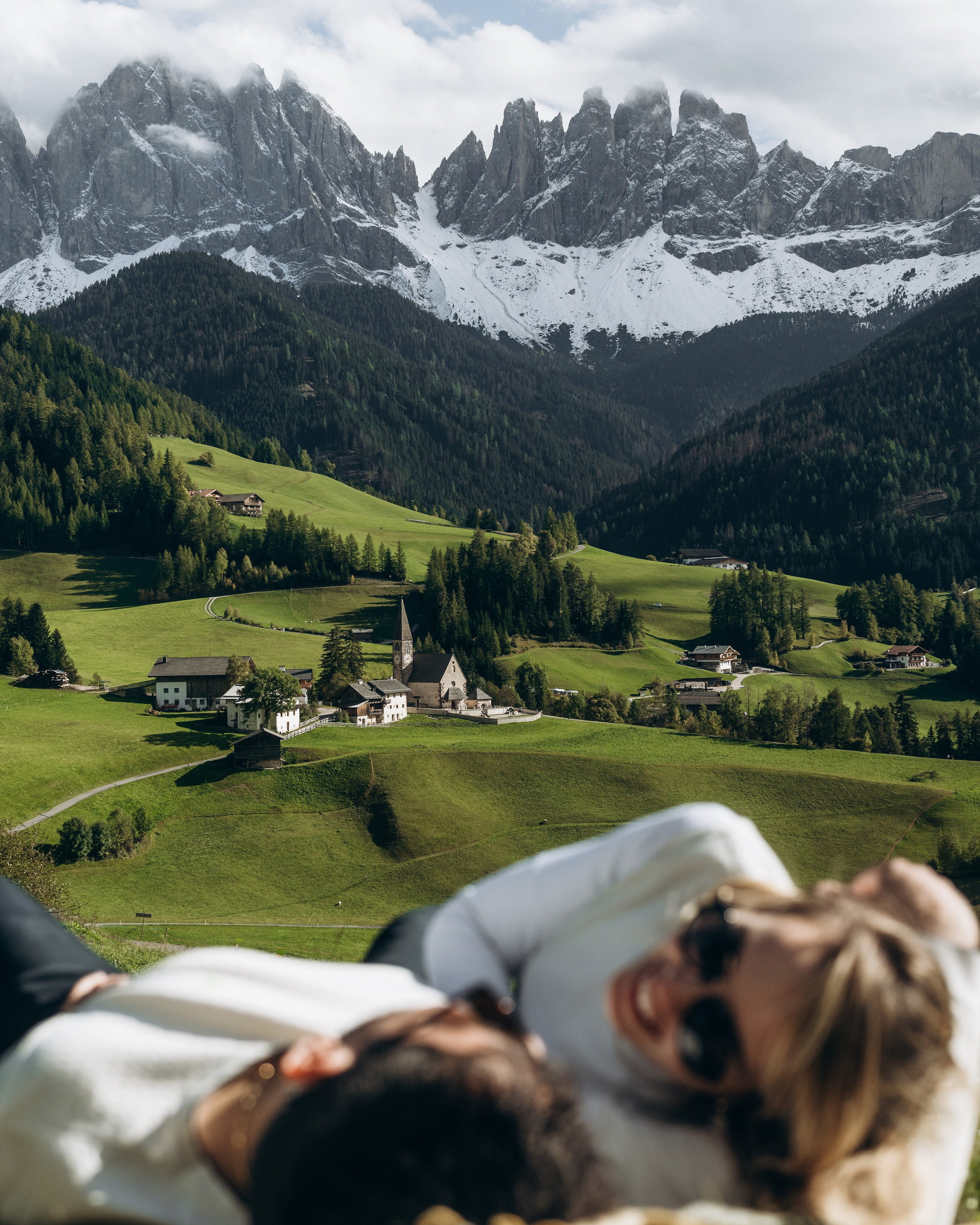 Couple moments of love with breathtaking views of the Dolomites and val di Funes