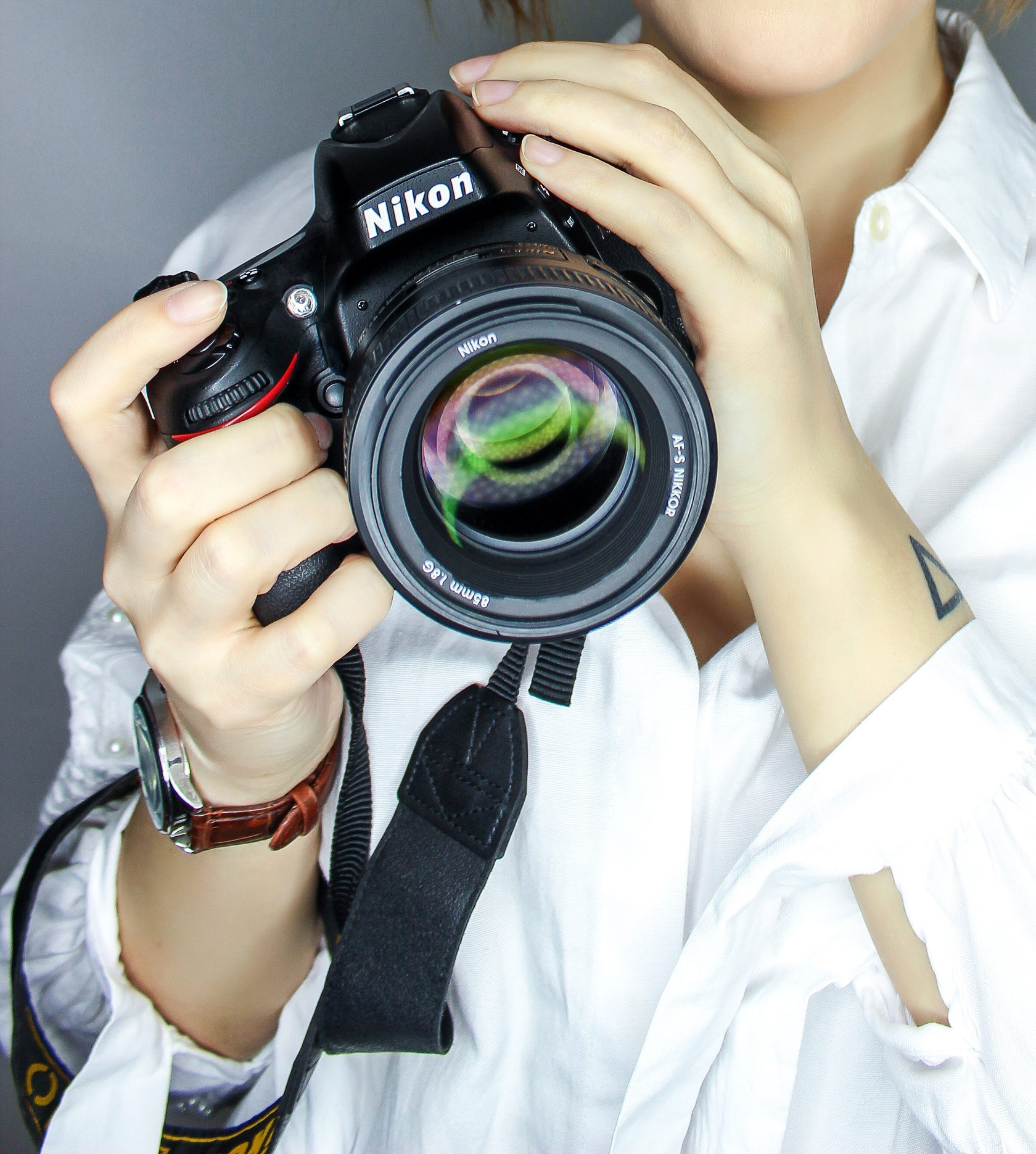 Camera in hands ready to capture the moment