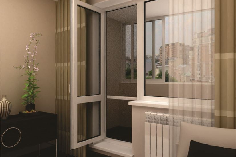 Пластиковый балконный блок белого цвета с стеклопакетом в нижней части двери смотрится очень гармонично в любом интерьере.