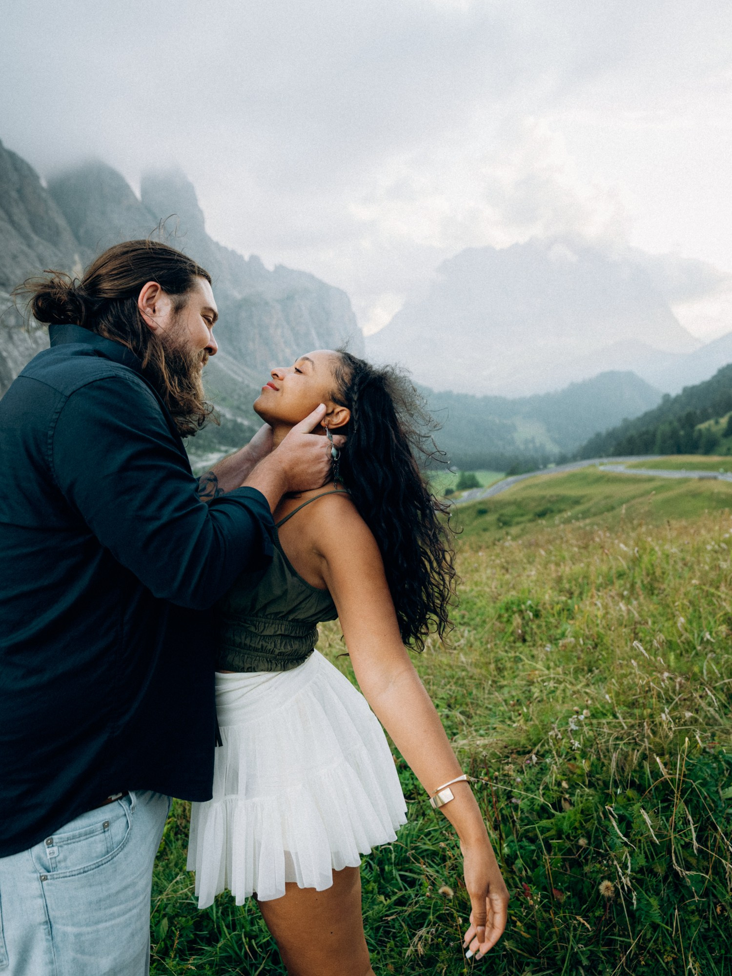 A couple on Gardena pass with sunset background