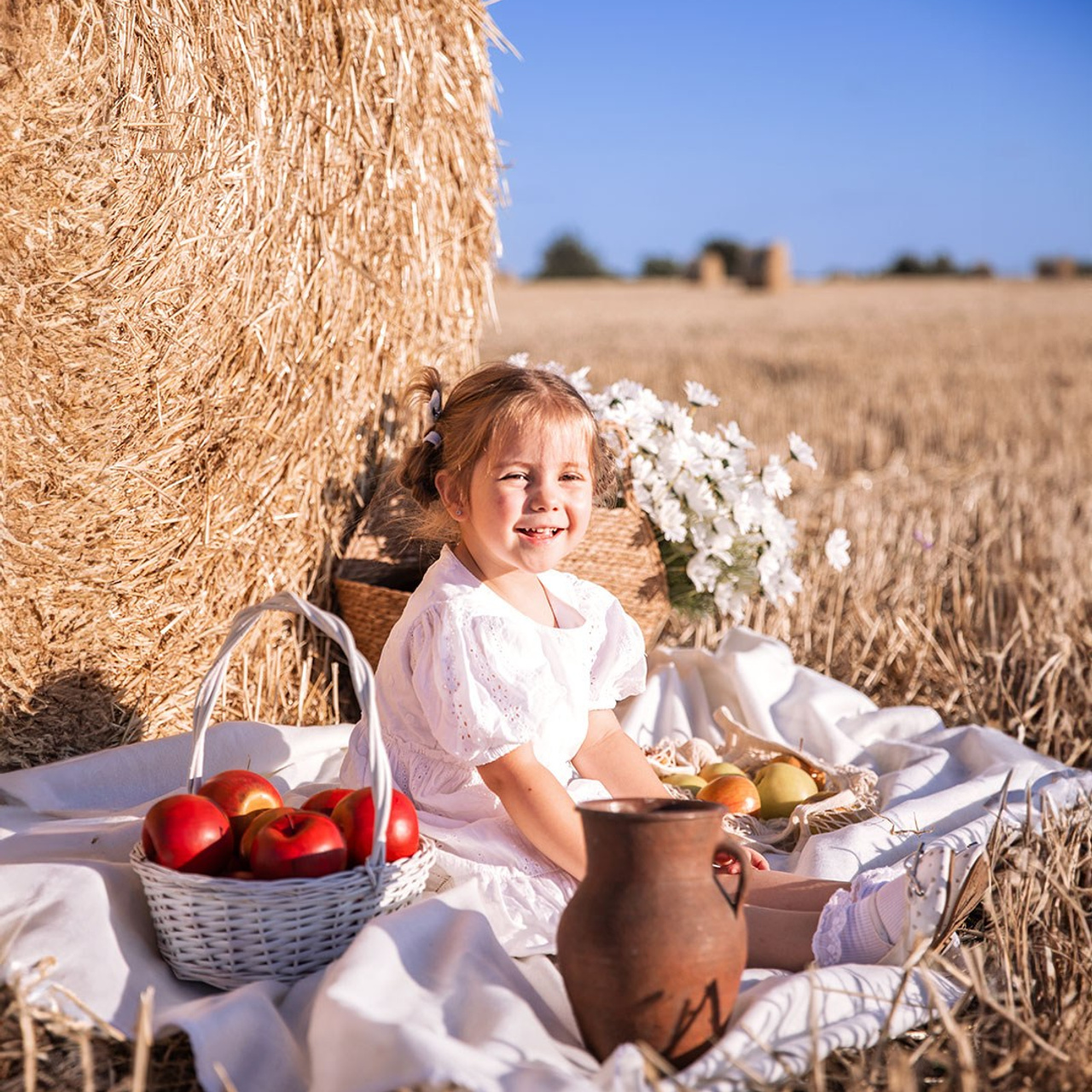 Дитяча фотозйомка в пшеничному полі